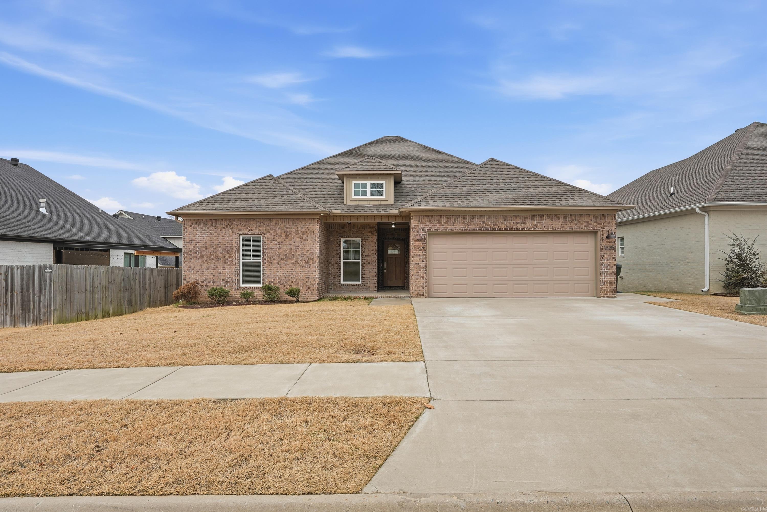 Step into this beautifully designed, move-in-ready home in West Conway where modern style meets everyday comfort. From the moment you enter, the open living space impresses with soaring 10-foot ceilings and oversized energy-efficient windows that fill the home with natural light. The kitchen is thoughtfully designed for both daily use and entertaining, showcasing quartz countertops, a generous island, and stainless-steel appliances—all within easy reach for practical, low-maintenance living. Clean lines, statement lighting, and striking built-in bookshelves in the hallway add character without excess.  The private primary suite serves as a relaxing retreat, complete with a soaking tub, walk-in shower, and a spacious walk-in closet. With a split floor plan, the primary suite remains peacefully separated from the rest of the home—perfect for quiet mornings and uninterrupted evenings.  Across the home, three additional bedrooms and a full bathroom provide flexible space for guests, hobbies, or a home office. Energy-efficient features such as a tankless water heater and spray foam insulation keep utility costs down. This turnkey home offers modern design with the setup ideal for you!