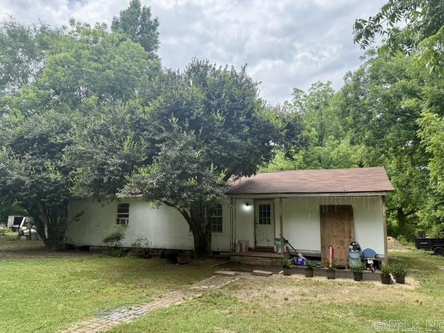 Priced right, ready for a new owner to take over the remodel that has been started.  Sits on 2 acres, in the country.  All items in yard will be removed.  Looking for you next project or something you can make your own, look no further.