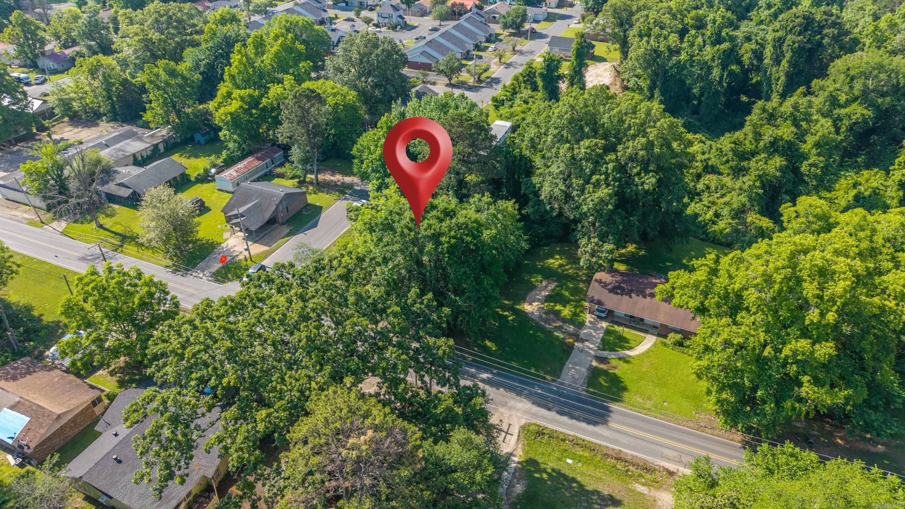 Discover the opportunity to build in the heart of Arkadelphia! These vacant subdivision lots offer a convenient location with a natural setting, just minutes from shopping, dining, local universities, recreation, and everyday amenities. Situated on a corner lot with scattered mature trees providing shade and character, this property is ready for your vision to come to life. Whether you’re planning a primary residence, weekend retreat, or investment project, these lots offer flexibility and potential in a well-located area. Don’t miss the chance to own land in one of Arkadelphia’s convenient and growing locations!