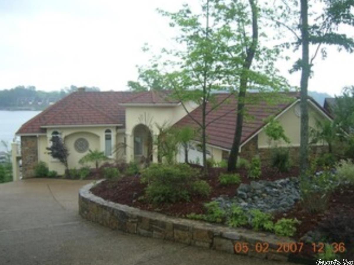 Lovely 4-bedroom, 3.5 bath home on the main channel of Lake Hamilton.  Home has had numerous updates and boasts views of the water from almost every room. Year-round deep water with a boat and jet ski dock.