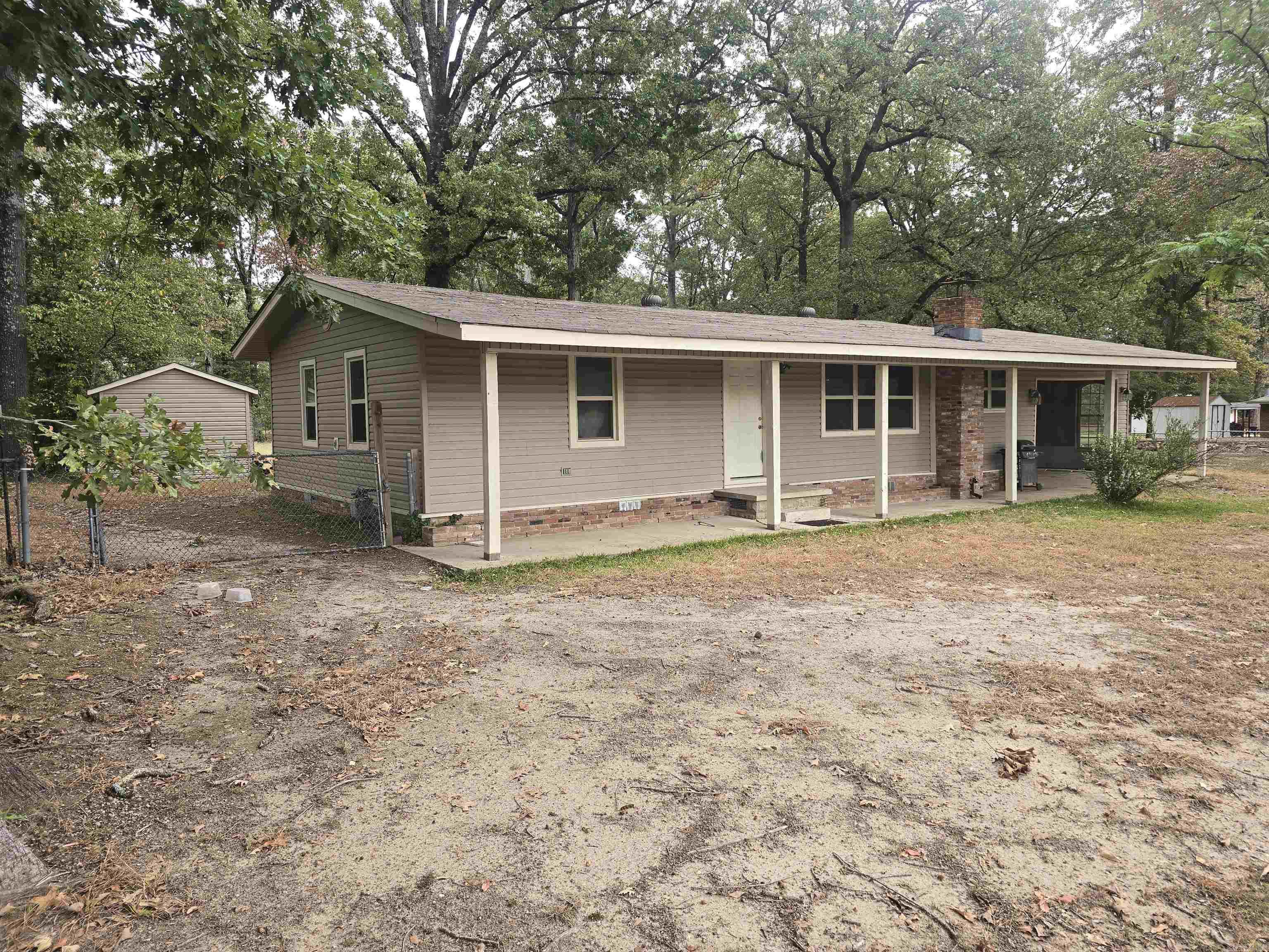 Fixer-Upper Opportunity on a Nice Level Lot! This 2-bedroom, 1-bath home sits on a beautiful level lot and offers plenty of potential for the right buyer. The interior needs some finishing work—including new flooring, sheetrock repair, and fresh paint—but with a little effort, this property could make a great home or investment. Outside, you’ll find a storage shed perfect for tools, lawn equipment, or hobbies. Whether you’re a first-time buyer looking for a project or an investor seeking your next renovation, this property has solid bones and great potential.  AGENTS SEE REMARKS