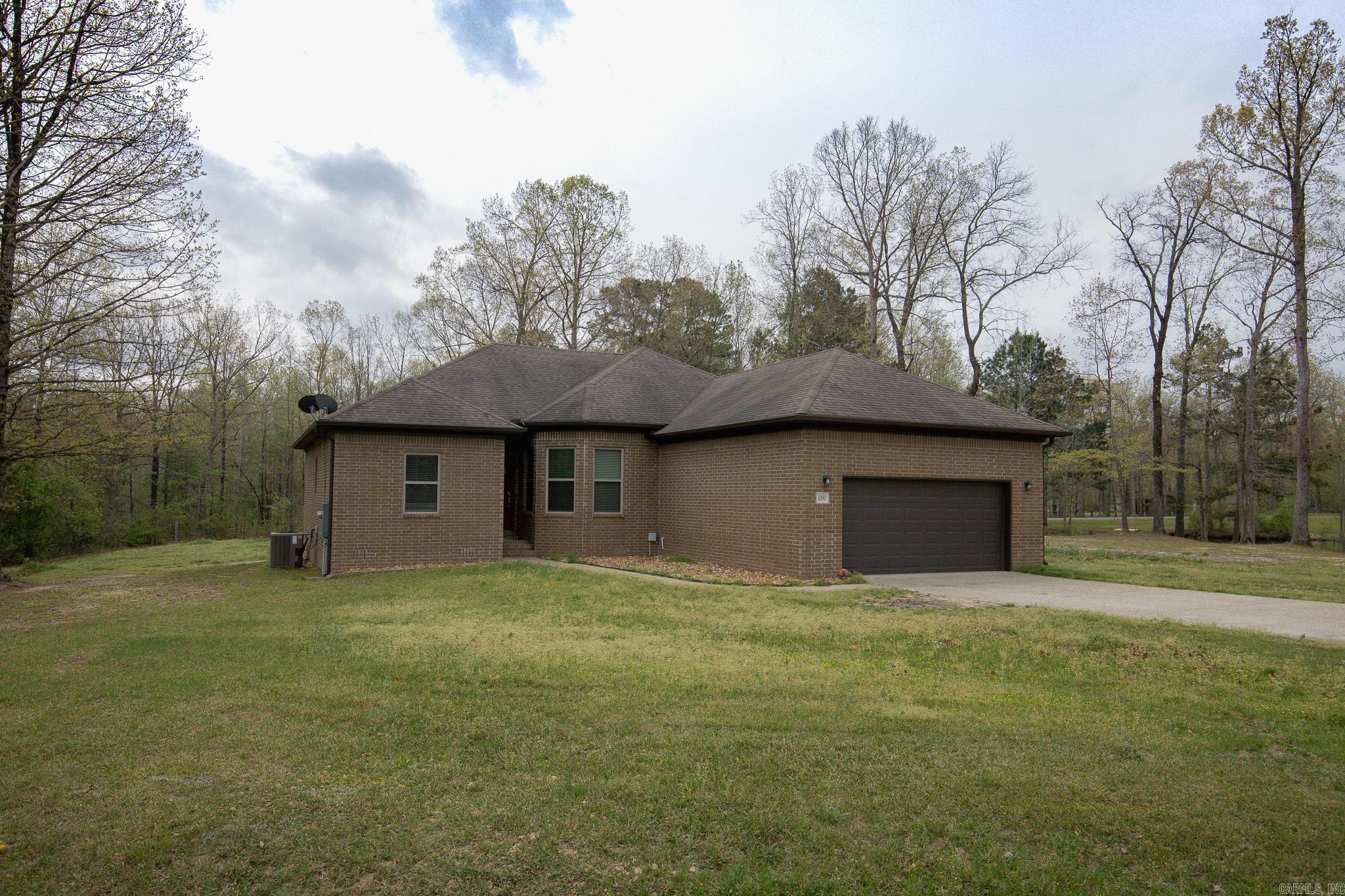 Welcome to this beautiful brick home situated on 1.60 acres in a small neighborhood of newer homes.  Check the boxes for space, privacy, and a move in ready home!  Inside there is a spacious layout with beautiful wood flooring, abundant natural light, and a neutral color palette. The kitchen offers plenty of cabinet and counter space and flows nicely into the living room.  Primary suite provides a relaxing retreat & separate from additional bedrooms. There is also a separate dining room that could be an office space for you! Outside you'll enjoy the wide-open space with room to build a hop, pool or dream outdoor garden.