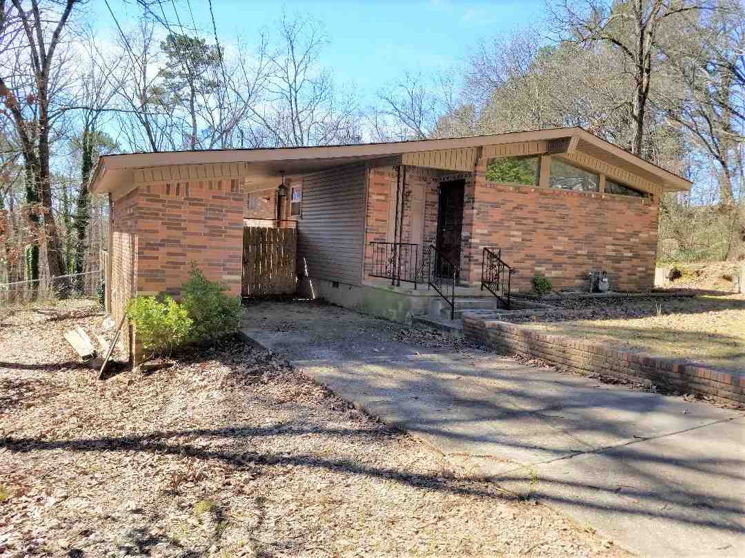Charming home in a centralized location. This nicely updated home sits on a large lot, fenced backyard and offers lots of privacy. The updates include new heat and air, updated electrical, water heater and tiled counter tops.