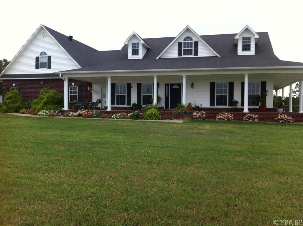 CUSTOM BUILT 3900 Square foot home on 10 acres surrounded by White Vinyl Fence! This home has it all from tall ceilings to beautiful hardwood floors, garden tub, fireplace, office, 5 bedrooms 4 Baths, and a awesome view from the column wrap around porch. The floor plan of this custom built home is something you don't see everyday and we would love to show it to you. The shop the land the horse barn the, the the, the list just goes on. Truly an amazing house in POTTSVILLE school district.