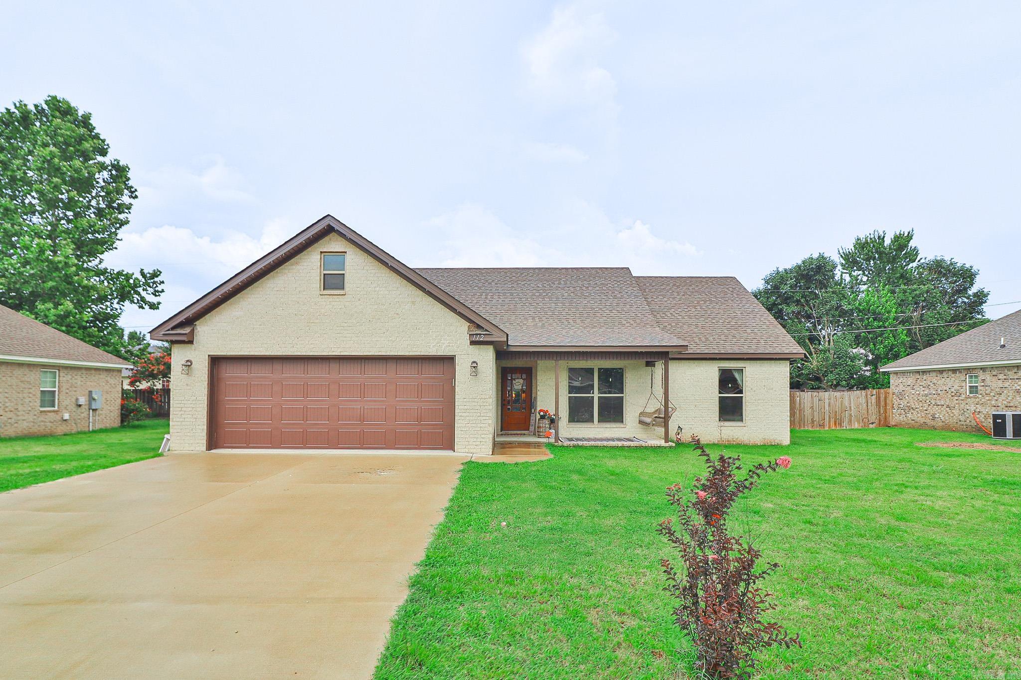 Located in the Qualls Subdivision of Lake City, this all-brick home offers 4 bedrooms, 2 bathrooms, and a comfortable split floor plan designed for everyday living. LVP flooring runs through the main living areas, while the bedrooms feature carpet for added comfort. The spacious primary suite includes a bathroom with a separate tub and shower, plus direct access from the laundry room into the primary closet. Outside, the 0.24-acre lot offers covered front and back porches, giving you plenty of space to relax or entertain. With a practical layout, modern finishes, and a convenient location, this home is ready for its next owner.