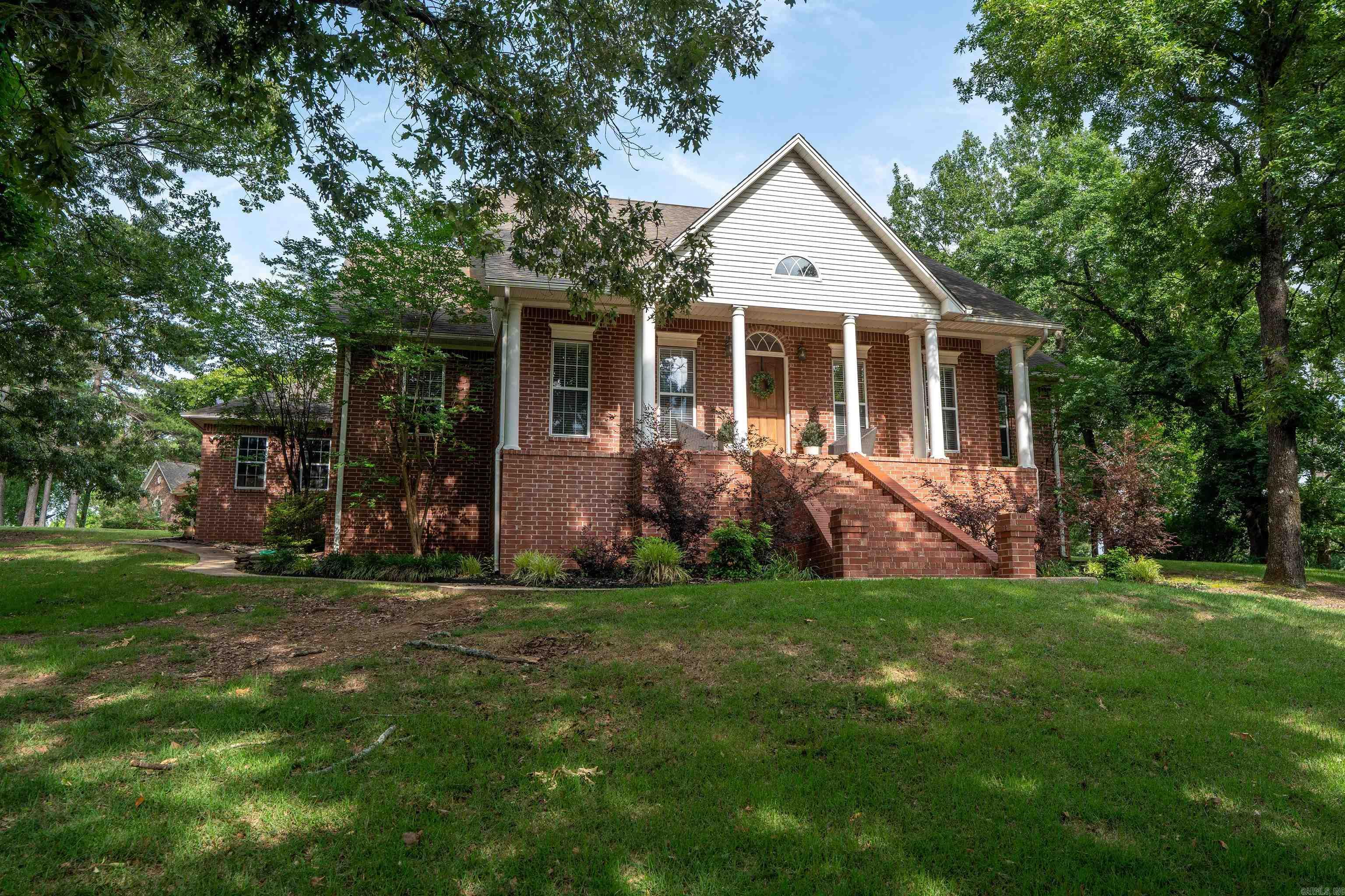 Just listed in Club West Estates!  This stunning 4-bedroom, 3.5-bath home has room for everything — and everyone! Sitting on over 1 acre, this property is packed with incredible features and thoughtful updates throughout.  Inside you’ll find a formal dining room, informal dining area, private office, enormous upstairs bonus space, large laundry room, enclosed sun-room, tons of closets, and beautiful built-ins throughout the home.  The completely updated kitchen is truly the heart of the home featuring custom cabinetry, granite countertops, double ovens, a gas stove, and plenty of space for cooking and gathering. The open-concept kitchen and living area is perfect for large families or entertaining guests, while the cozy fireplace makes it easy to relax at the end of the day.  The spacious primary suite offers a huge walk-in closet with custom built-ins, and you won’t believe the size of the upstairs bedrooms — each with its own sitting/living area plus access to the oversized bonus room upstairs! Enjoy peaceful mornings on the front porch rocker or unwind in the enclosed back porch on rainy days.  This home truly has it all — space, charm, updates, and room to grow!