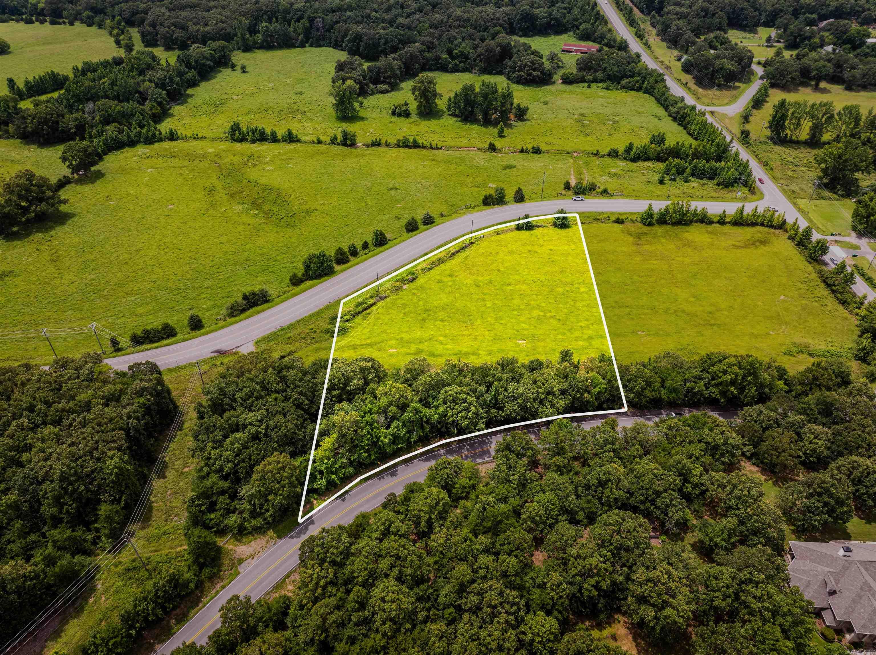 Escape the hustle and bustle without giving up convenience. This is Lot two of seven premium tracts of land we are offering, each three acres more or less with a blend of open fields and serene wooded areas-perfect settings for your dream home!  *Beautiful Building Sites  *Utilities Already in Place  *Percolation Tests Completed  These tracts are ready for you to build the lifestyle you've been envisioning. Don't miss the chance to secure your piece of peaceful living just minutes from the city