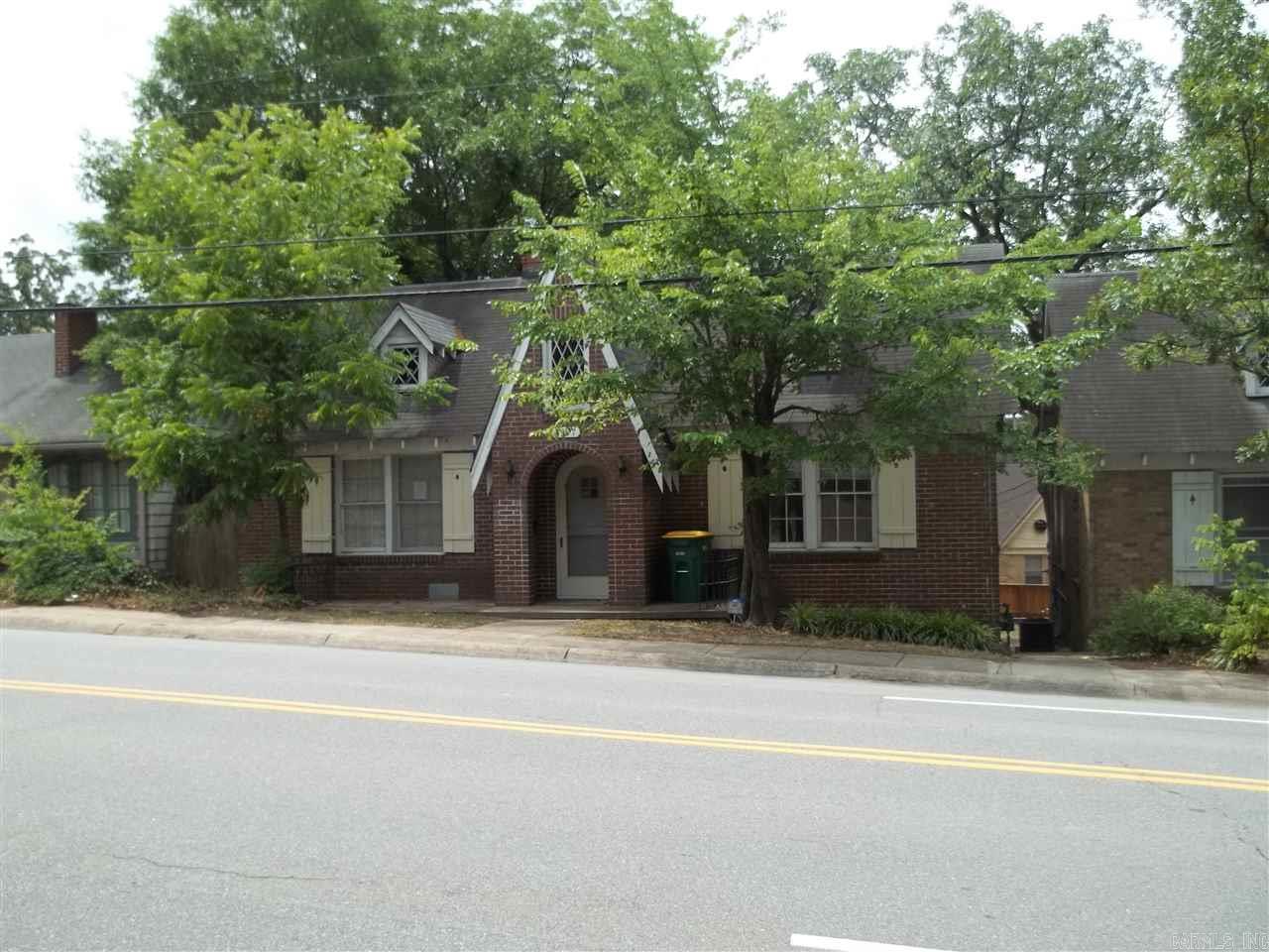 Charming Stiff Station home near UAMS. Decorative fireplace and mantle in living room. Hardwood floors throughout , except kitchen & bath. Kitchen has ample storage & appliances include gas range, dishwasher & nice fridge. Maintenance free, including yard. Off street parking. Call TODAY! Marshall Peters & Associates 501-414-8340