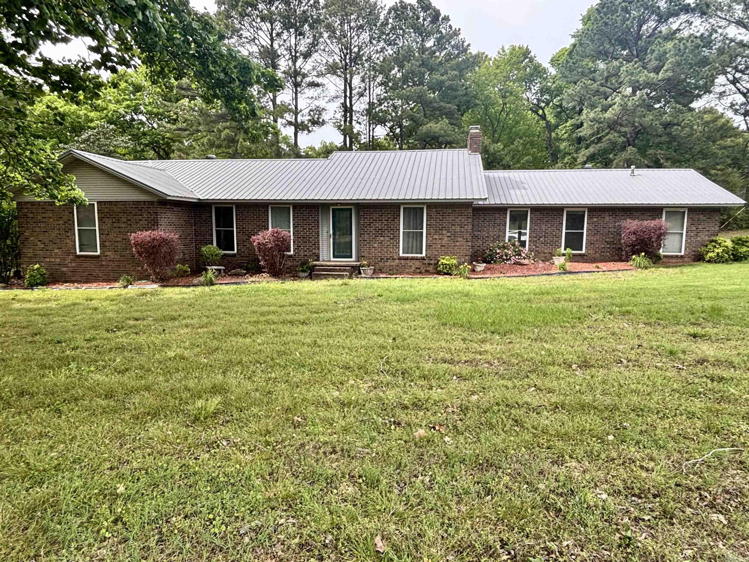 This spacious 4 bedroom, 2.5 bath home, with an additional space that has been used as an office/5th bedroom.  There is a bonus room off of the kitchen to use as a man cave, or large hang out room for the kids.  This home is right next to the Country Club where you can enjoy, golfing and swimming all summer long.  You will be in the city limits, but still have the feel of living in the quietness of the country.  Minutes from the highway to run to Searcy, and just up the road from the school and local shopping.  This neighborhood offers a nice area to take a nightly walk or bike ride.