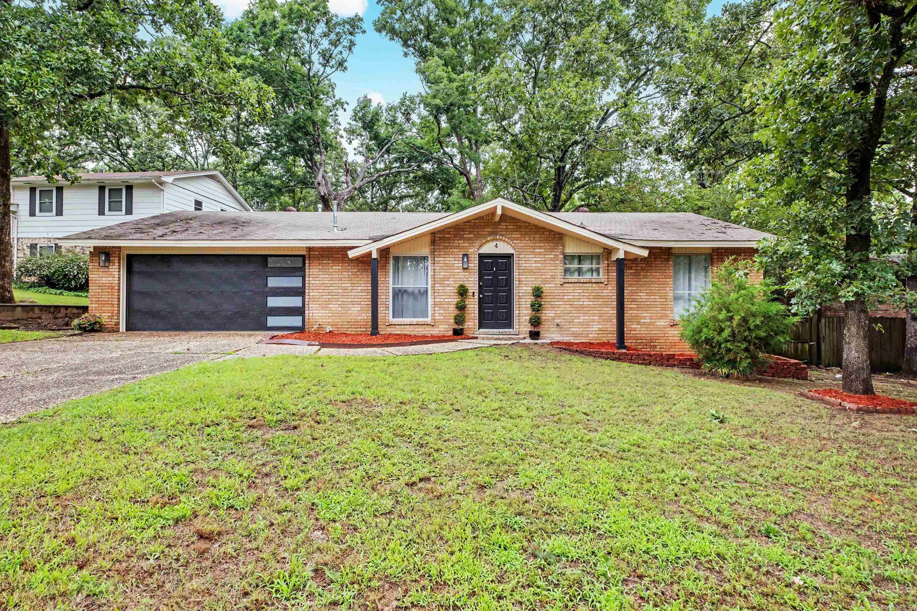 Welcome home to this amazingly remodeled 3-bedroom, 2-bath home tucked away in a quiet cul-de-sac! Designed with both comfort and entertaining in mind, this home offers multiple spacious areas perfect for gathering with family and friends. The oversized kitchen features granite countertops, breakfast bar, an abundance of cabinet space, new appliances with plenty of room to cook, host, and create memories. Enjoy peace of mind with a new HVAC system installed in 2023 and a maintenance-free exterior for easy living. The great room and separate dining area provide flexible open-concept living spaces, while the large backyard is ideal for entertaining, relaxing, or enjoying outdoor family time. Conveniently located close to shopping, dining, and everyday amenities, this move-in ready home is the perfect blend of style, space, and location! See documents for a complete list of the many updates. AGENTS SEE REMARKS.