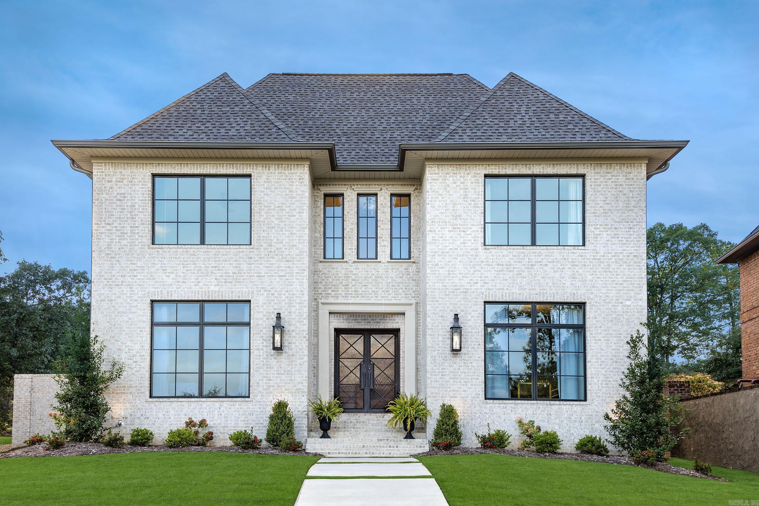 Tucked inside the prestigious gated golf course community of Hallen Court in Chenal Valley, this stunning home offers the perfect blend of luxury, comfort, and personality all backing up to manicured green space. Featuring 5 bedrooms, 4.5 bathrooms, a dedicated office, and a formal dining room, this home was designed with both everyday living and entertaining in mind. The vaulted kitchen and living area create a grand yet inviting space, complete with a beautiful fireplace and an abundance of windows that flood the home with natural light while showcasing the private backyard oasis. The chef’s kitchen is a true centerpiece, boasting elegant quartzite stone countertops, ample workspace, and seamless flow to the covered patio — perfect for outdoor dining or relaxing poolside. Step outside to enjoy your own private retreat overlooking the sparkling pool, and covered patio ideal for hosting or unwinding in peace. Upstairs, you’ll find uniquely designed bedrooms. A spacious home theater provides the ultimate entertainment experience for movie nights, game days, and gatherings. Schedule a tour today!