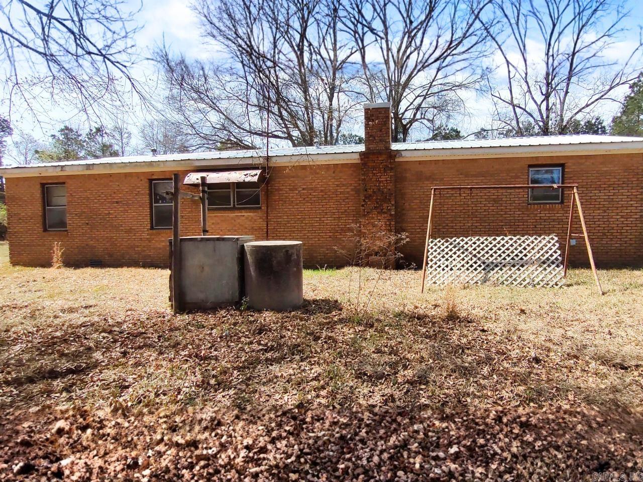 This 2 bedroom, 1 bath brick home sits on 2.28 acres out in the country just minutes from Bearden and Thornton. This home is being sold AS-IS WHERE-IS, no repairs. Lot size, acreage, & square footage taken from courthouse records.