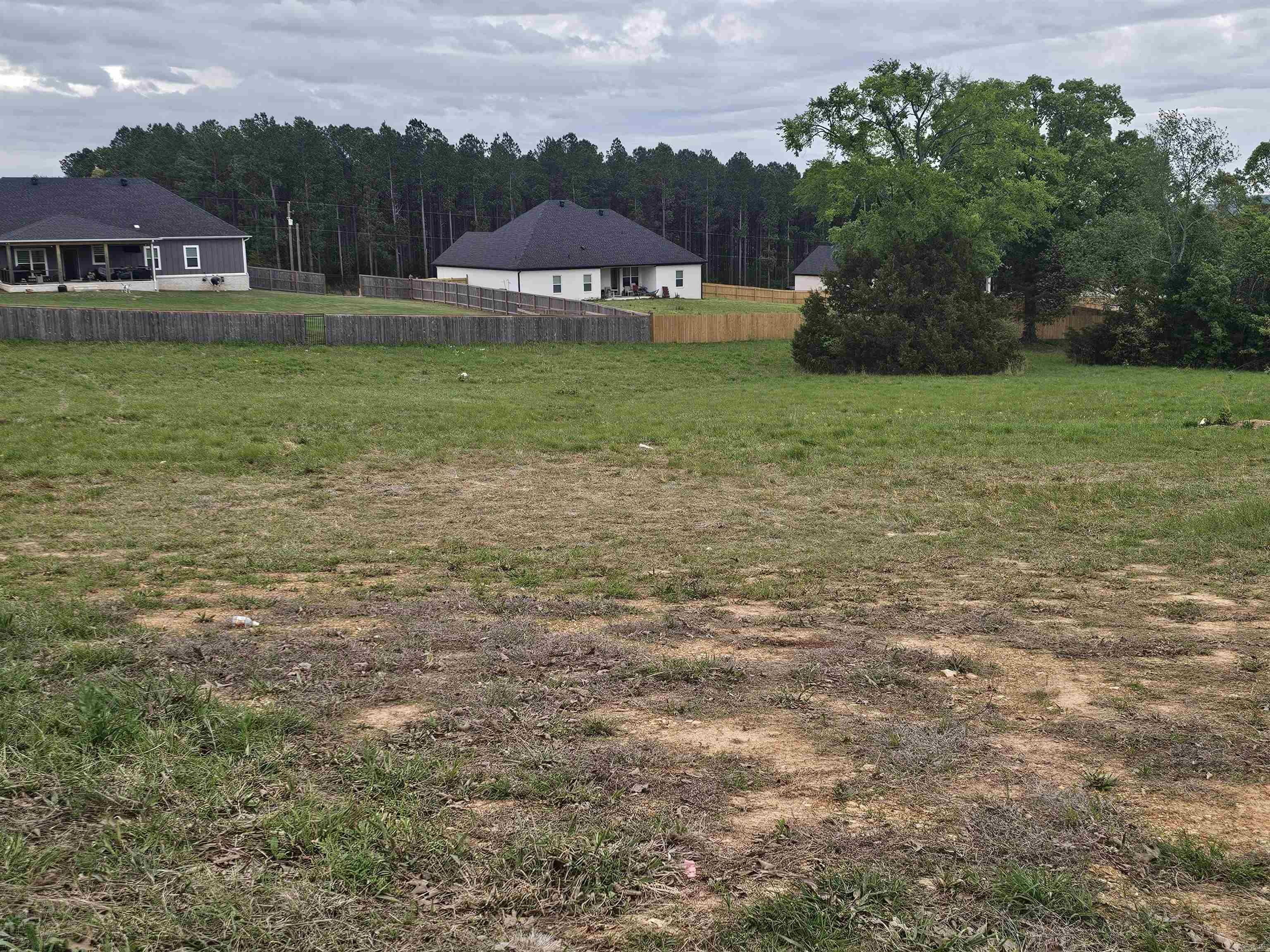 Opportunity to build a brand new custom home with Triple E Custom Homes in Greenbrier on these beautiful homesites that blend space, privacy, and convenience. Don’t miss your chance to secure your place in this sought-after location! Agents see remarks.