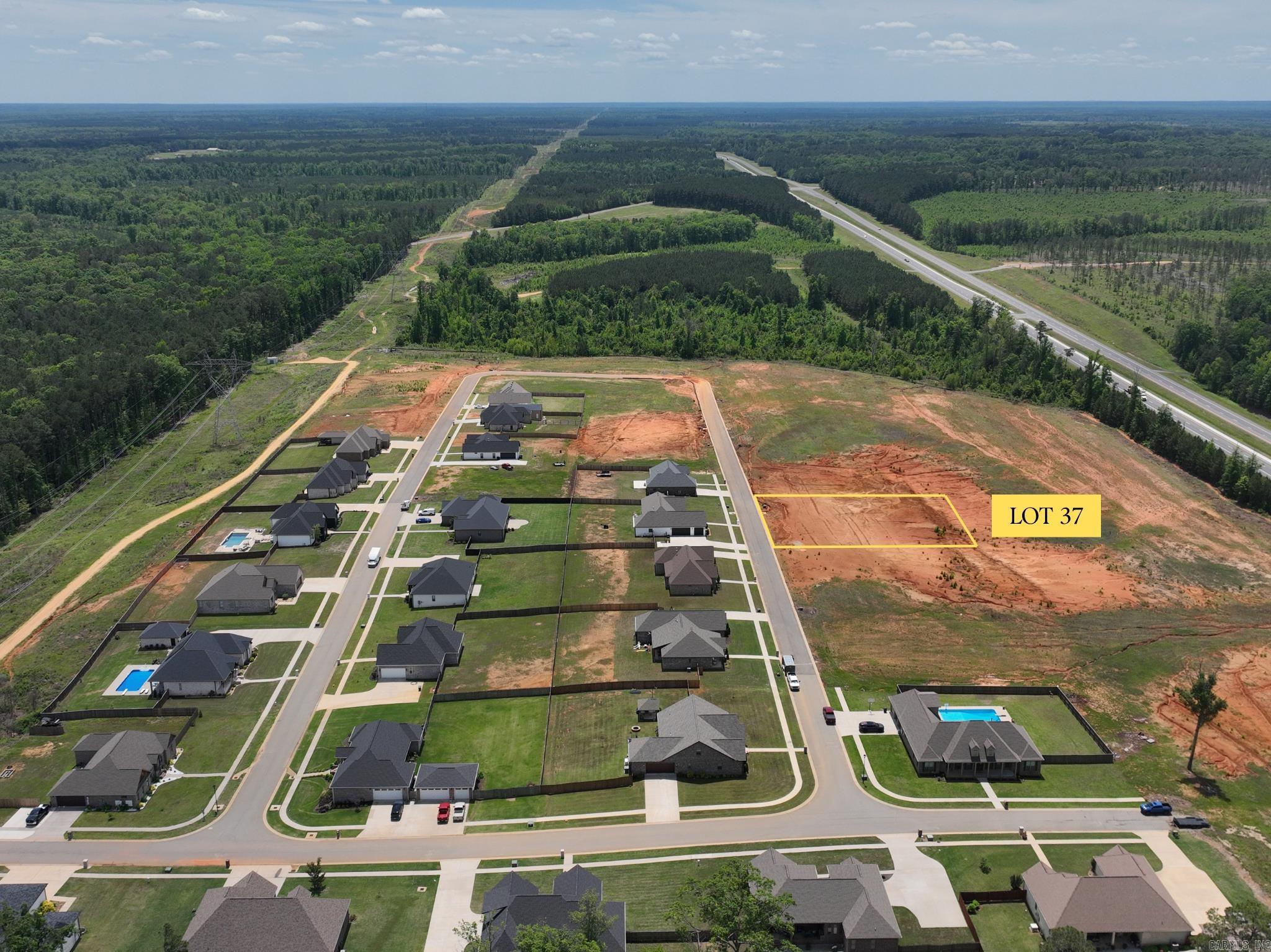Build your future home in the peaceful Oak Tree South subdivision in Sheridan, Arkansas. Lot 37 offers a convenient location just minutes from Hwy 167, providing quick access to Sheridan, Little Rock, and surrounding areas while still enjoying a quiet residential setting. This homesite combines small-town comfort with easy access to shopping, dining, schools, and everyday amenities. Don’t miss this opportunity to own a residential lot in one of Sheridan’s growing areas.