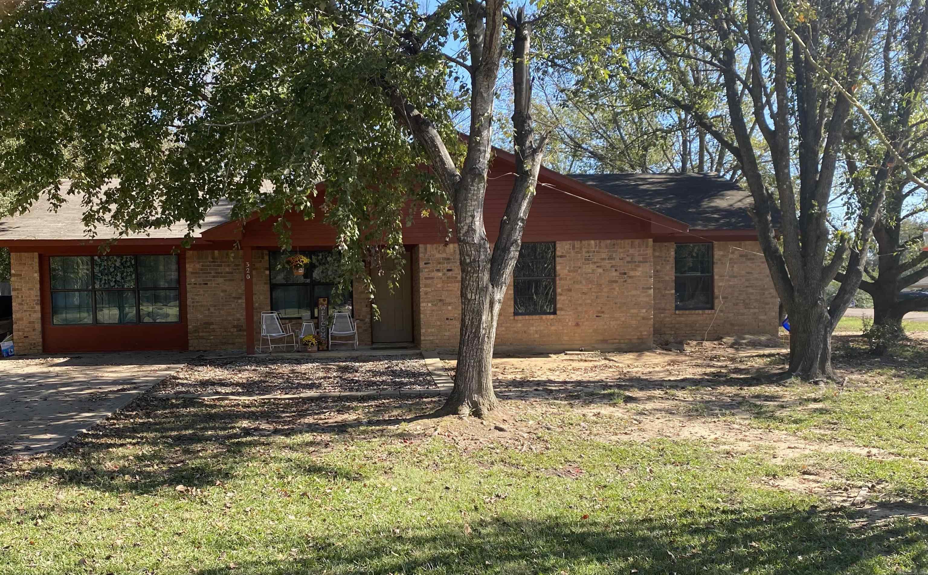 4BR/2BA Brick Home with covered Patio on a Corner Lot. Home offers a Large Living Area, Kitchen/Dining Area separated with Tile Bar. Large Utility Room with lots of storage. Refrigerator Conveys, Above Ground Pool Conveys, 10x16 Storage Building wired for electricity Conveys. Within the last year, there has been new lighting, new flooring, new paint, new kitchen sink, new vent hood, new bathroom vanities and commodes.
