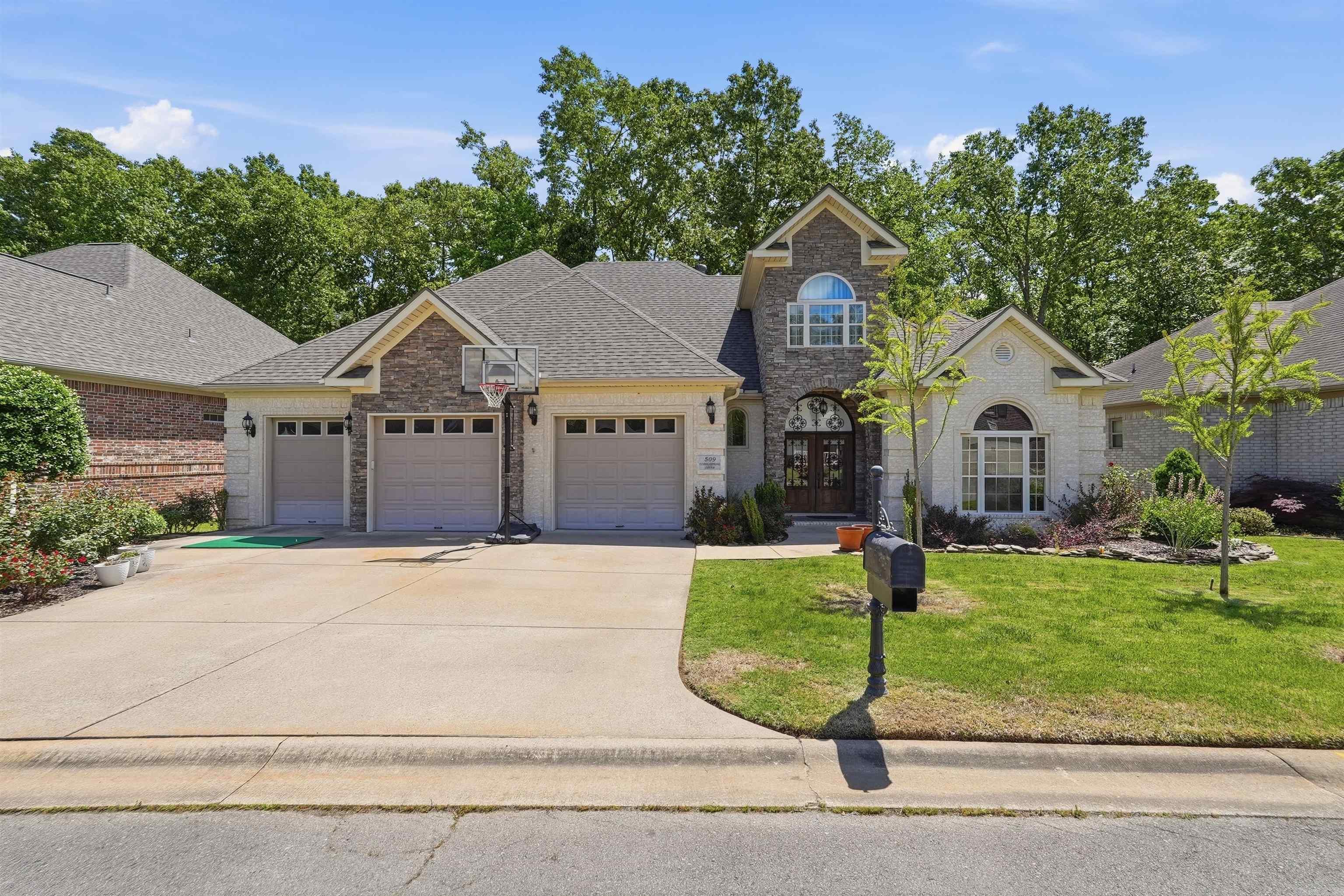 Built with care and designed to last, 509 Cobblestone Drive is the kind of home that earns a second look. Inside the Greystone Country Club community, this three bedroom, three bathroom home features hardwood floors, granite countertops, an open concept layout, and a covered courtyard porch backing to a private wooded view. The upstairs bedroom could also made a great playroom, movie room, workout space, and so much more!  At 2,663 square feet, there's great room to host and make memories in this wonderful home!