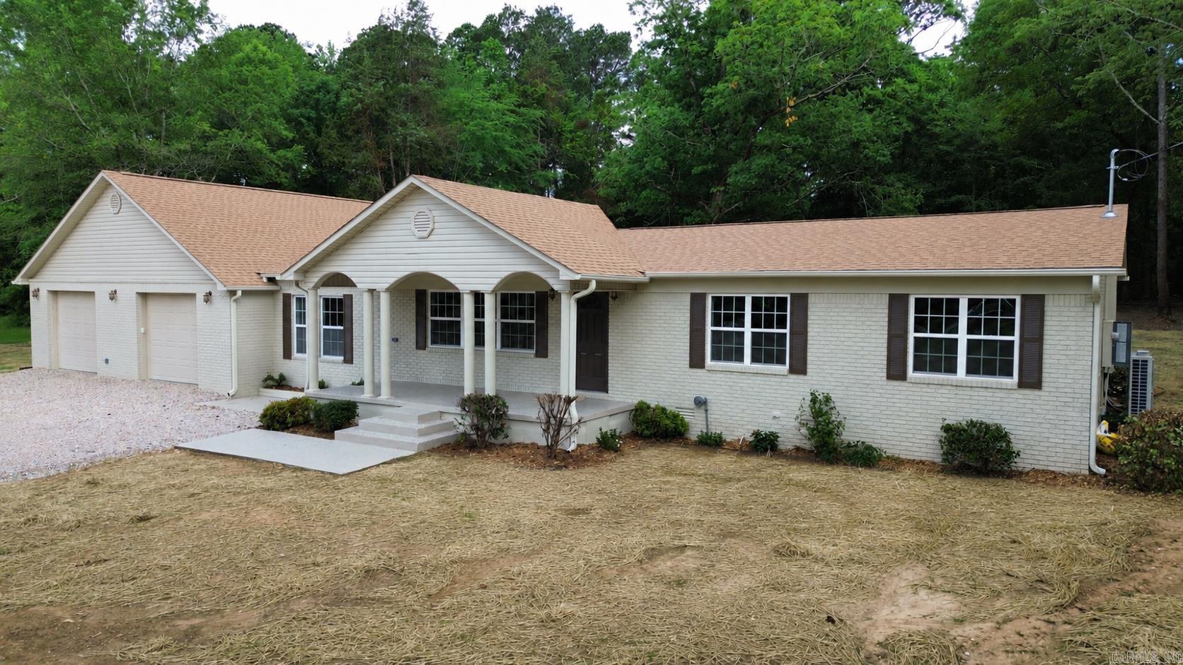 Remarkably renovated 4-bedroom, 2-bath home situated on approximately 3.81 acres in the highly sought-after Ouachita School District. This beautifully transformed property features all-new electrical, plumbing, HVAC, flooring, appliances, cabinets, countertops, fixtures, and more. An oversized garage provides ample storage and workspace, while the large deck offers the perfect place to relax and enjoy the peaceful surroundings. The stunning gated entrance adds both charm and privacy to this incredible property. With plenty of space to spread out and enjoy country living, this is a home you don’t want to miss.