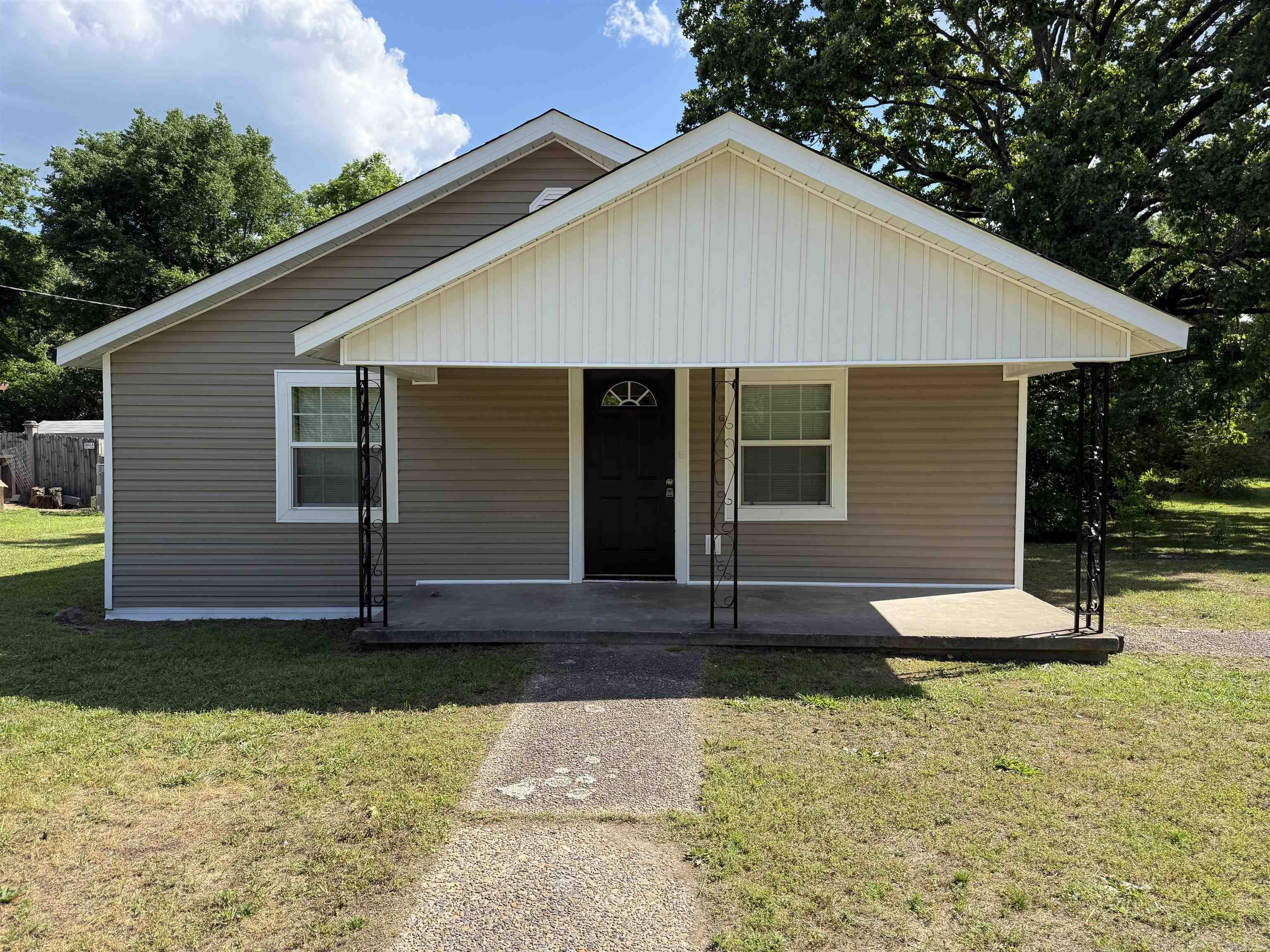 NEW HOME READY FOR LEASE/RENT! Come tour this beautifully fully renovated  2-bedroom, 1-bath home located less than 10 minutes from Downtown Little Rock, the airport, the interstate, shopping and schools.   This turnkey adorable home features brand-new stainless steel appliances, durable LVP flooring, new siding and windows, and fresh interior and exterior paint throughout. Enjoy thoughtful upgrades including tray ceilings, a pristine modern bathroom, and a spacious walk-in pantry.   The home offers ample parking with a convenient circular driveway and sits on a generous lot, perfect for enjoying outdoor space. Newer windows, central heat and air and newer roof makes this home energy efficient. Stress free maintenance because landlord takes care of the lawn!  * Lawn care included in rent  * Home professionally cleaned and is ready for move-in.   * Pets welcome - Restrictions and deposit required  * $1,100.00 monthly rent and $1,100. Security deposit required before move-in.   * Online application and verification required.   * Apply here: www.avail.com/apply/EoXQbW8    * Contact us for more details or to request a video tour!   * Realtor friendly! Feel free to contact our team.