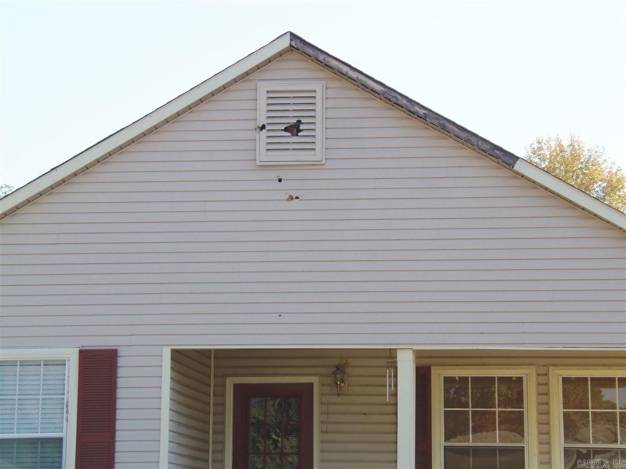 This property is to be sold "As Is". It has had water damage due to a water pipe bursting in the ceiling. The seller wants to sell the property in it's present condition. This could be a very good purchase for your investors! Nice house on the outside but work to do on the inside. Might qualify for a 203K HUD loan.
