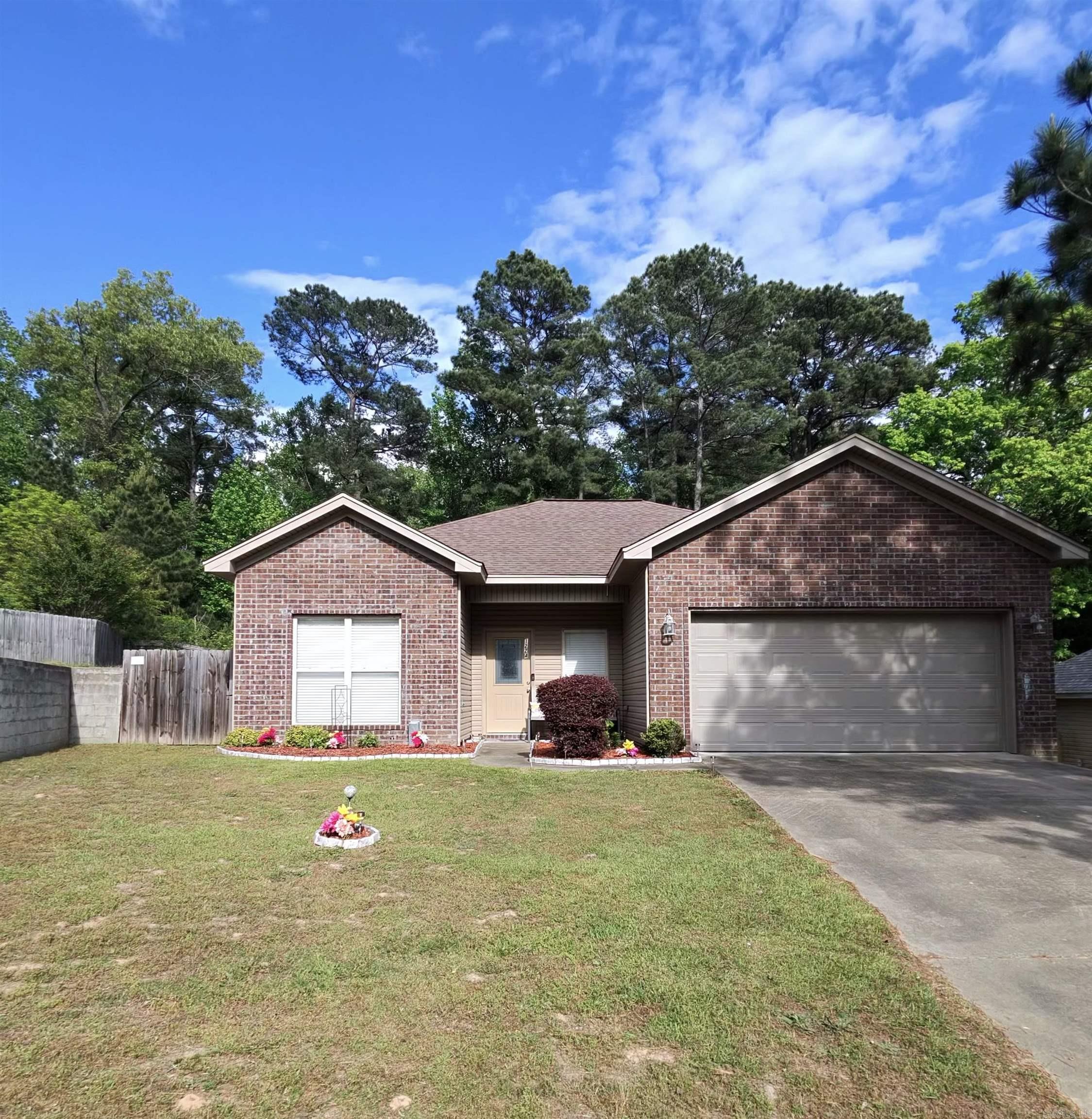 Charming, move-in ready home located on a quiet cul-de-sac! This 3-bedroom, 2-bath property features a split floor plan for added privacy, plus a 2-car garage. Crown moulding throughout the home. Recently renovated with new granite countertops, updated kitchen cabinets, new microwave, and laminate flooring throughout. Bathrooms have been refreshed with modern touches. Enjoy a spacious backyard—perfect for entertaining or relaxing. A great opportunity to make this home your own! Schedule your showing today and start creating lasting memories!
