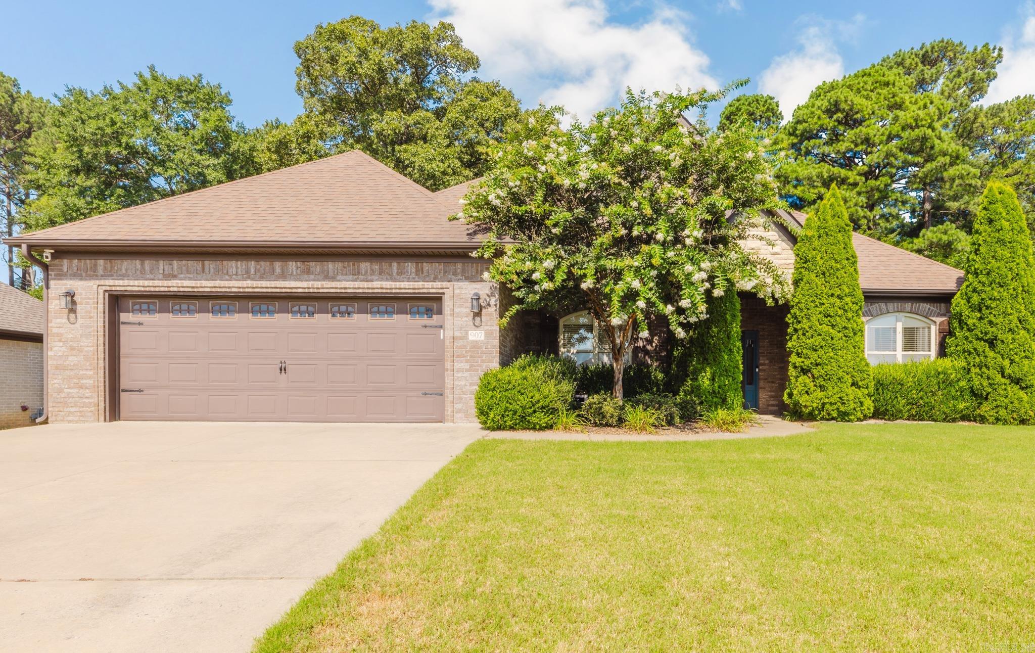 Welcome home to this beautiful 4-bedroom, 3-bathroom home in Andres Place, located in the Bryant School District. This home features a spacious living room with a gas log fireplace and hearth, creating a warm and inviting space to gather. The recently remodeled kitchen offers plenty of cabinet space, a large island with bar seating, and an eat-in dining area, making it perfect for everyday living and entertaining. The private primary suite includes a large walk-in closet, while the additional bedrooms and bathrooms provide plenty of space for family or guests. Step outside to enjoy the private backyard featuring a covered patio, outdoor kitchen, and swimming pool...perfect for relaxing or entertaining all summer long. Conveniently located near Bryant schools, shopping, and dining, this home has everything you need!