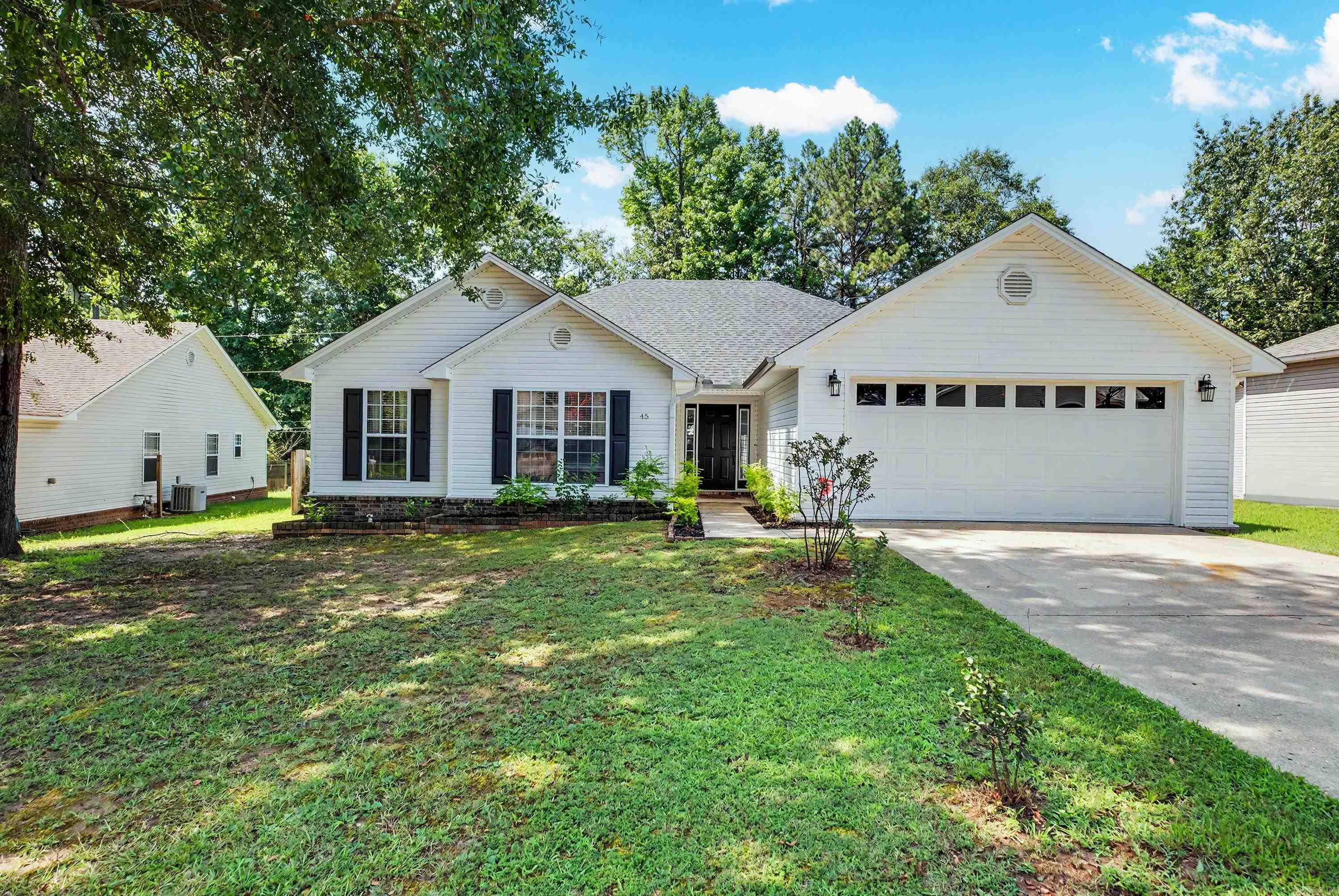 Privacy meets move-in ready. Tucked away on a quiet cul-de-sac in Sheridan, this 3BR/2BA, 1,763 sq ft home gives you the peace of a low-traffic street without sacrificing convenience. Inside, fresh paint and 1-year-old luxury laminate flooring (no carpet) make this home feel new without the new-build price. Appliances—stove, microwave, dishwasher, and refrigerator with ice maker—are just 1 year old, plus a convenient pantry. The primary suite is a true retreat: a large sitting area, a walk-in shower, and a jetted tub built for unwinding. Washer/dryer included. Outside, enjoy the covered rear porch, pergola, and fire pit: city utilities and Gigabit Fiber. Close to Sheridan schools, downtown, and shopping.