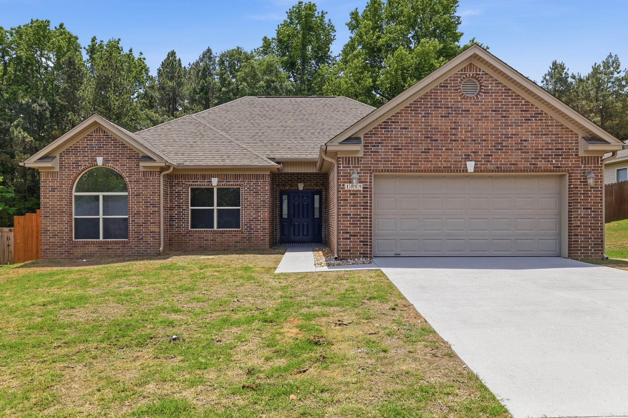 Seller is offering a $6,000 flooring allowance, giving the next owner the opportunity to personalize the home to their style! Welcome to 1009 Katy Ln in Alexander — a one-level home offering 4 bedrooms, 2 bathrooms, and 1,716 square feet with a functional split floor plan designed for everyday living. The spacious living area flows into the kitchen and dining space, creating an easy layout for gathering, entertaining, or relaxing at home. The private primary suite features a beautifully updated bathroom and generous closet space, while the additional bedrooms offer flexibility for guests, kids, or a home office. Outside, enjoy a fully fenced backyard with plenty of room to relax, play, or entertain. Conveniently located with easy access to shopping, dining, and the interstate, this home combines space, comfort, and value all in one package.