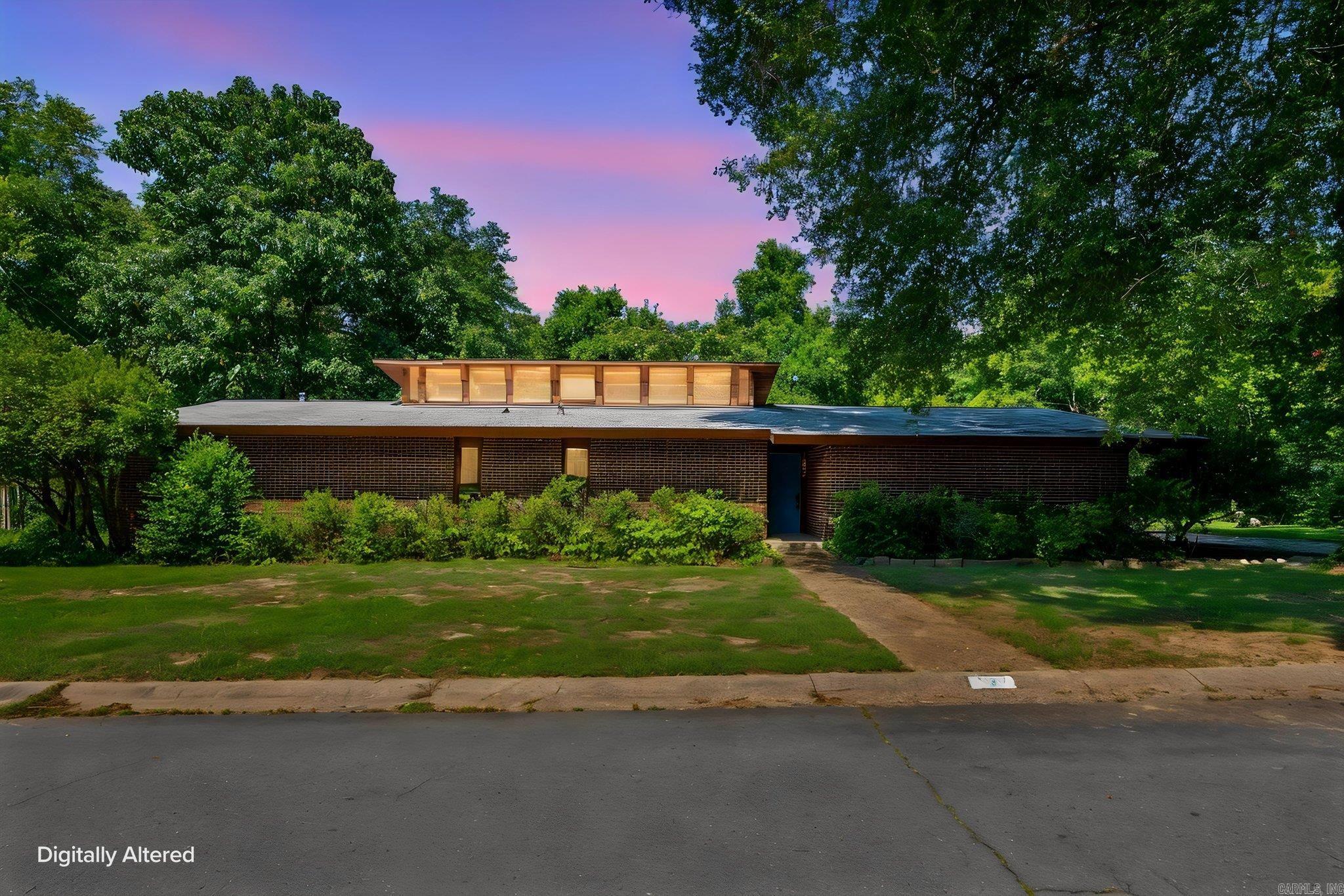 One-of-a-kind mid-century modern home in the desirable Leawood neighborhood. This single-level, 4-bedroom home sits on a flat lot and offers an exceptional layout with three living areas, a formal dining room, wood-burning fireplace, and inviting sun porch. Original 1960s details add timeless character, including terrazzo countertops, parquet floors, custom doors off the living and dining areas, vaulted ceilings, stained hardwood beams, and original wood finishes—all showcasing the home’s unique architectural charm. Conveniently located near Midtown shopping, local restaurants, and neighborhood amenities. The home is being sold as-is and is priced with needed repairs in mind, including repairs to exterior wood siding and roof, and potential HVAC ductwork repairs. A rare opportunity to restore and enjoy a true mid-century gem.