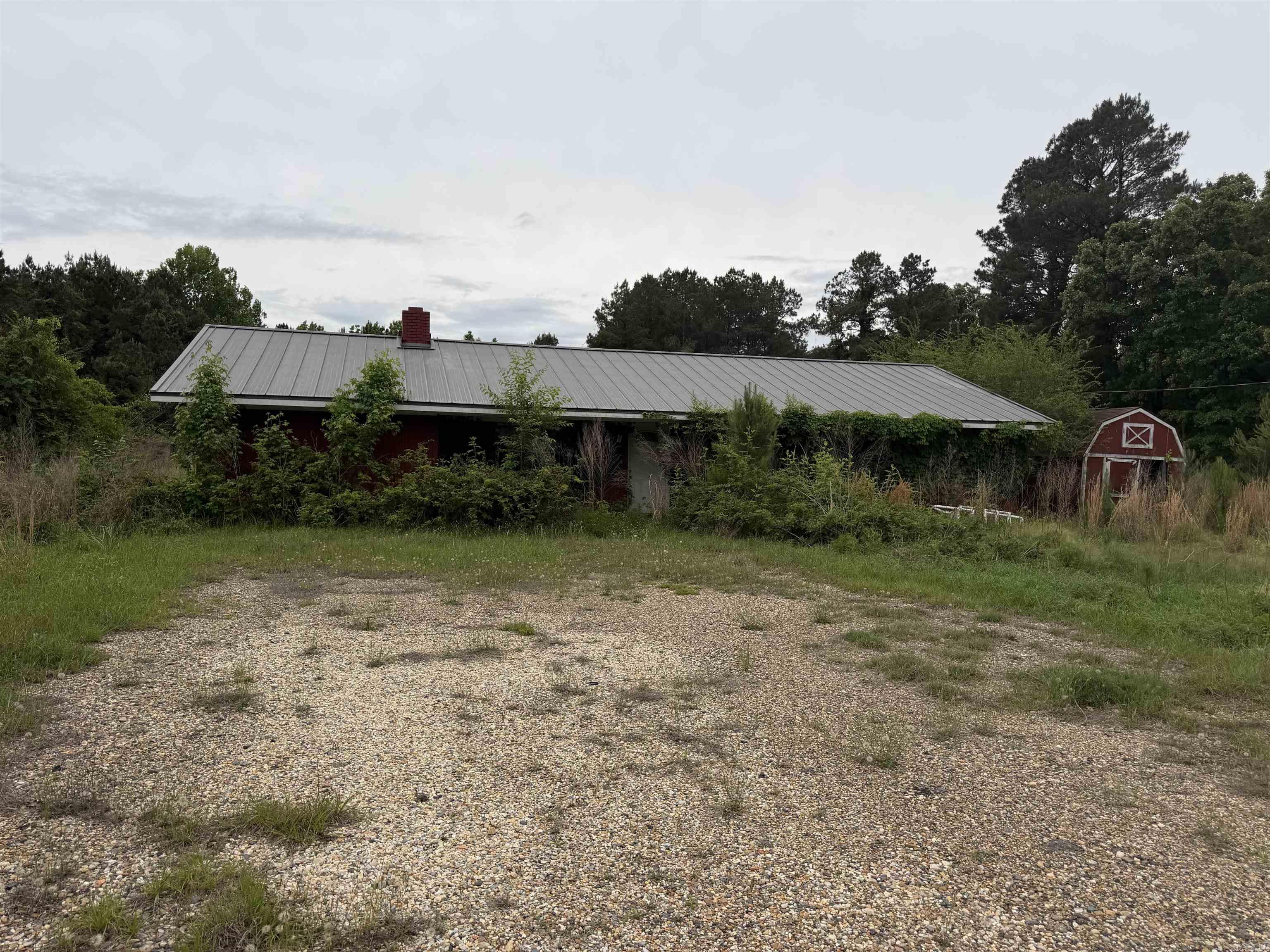 This home has been vacant for a couple years and will need a cleanup of both the house and the yard. However, the seller is overing the home at a price that a buyer should be willing to do some work. It has over 5 acres, a metal roof and a nice country setting.