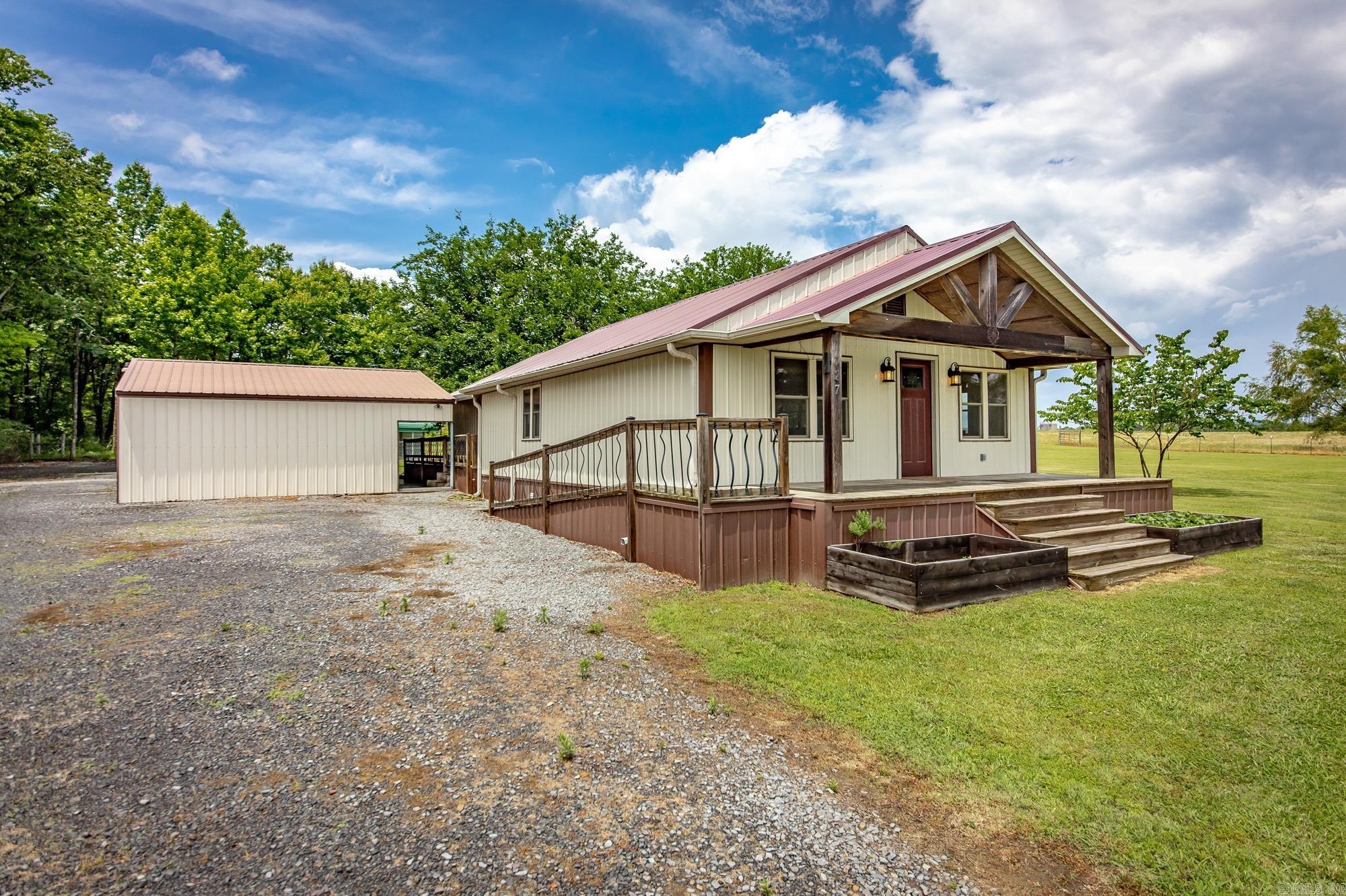 Country charm with modern updates! This adorable farmhouse on Culpepper Mountain offers 1,299 sq ft and was completely remodeled in 2017, including a new septic tank. Inside you’ll find vinyl flooring, updated appliances, central electric heat and air, plus a wood stove backup for extra comfort. Outside features include a storm shelter, double car carport, small shop with electric and roll-up door, wood storage building, and chain link fencing perfect for pets or children. The beautiful pasture is fenced and cross fenced with a pond, making it ideal for horses or livestock. Enjoy a private country setting with plenty of space while still being conveniently close to town.