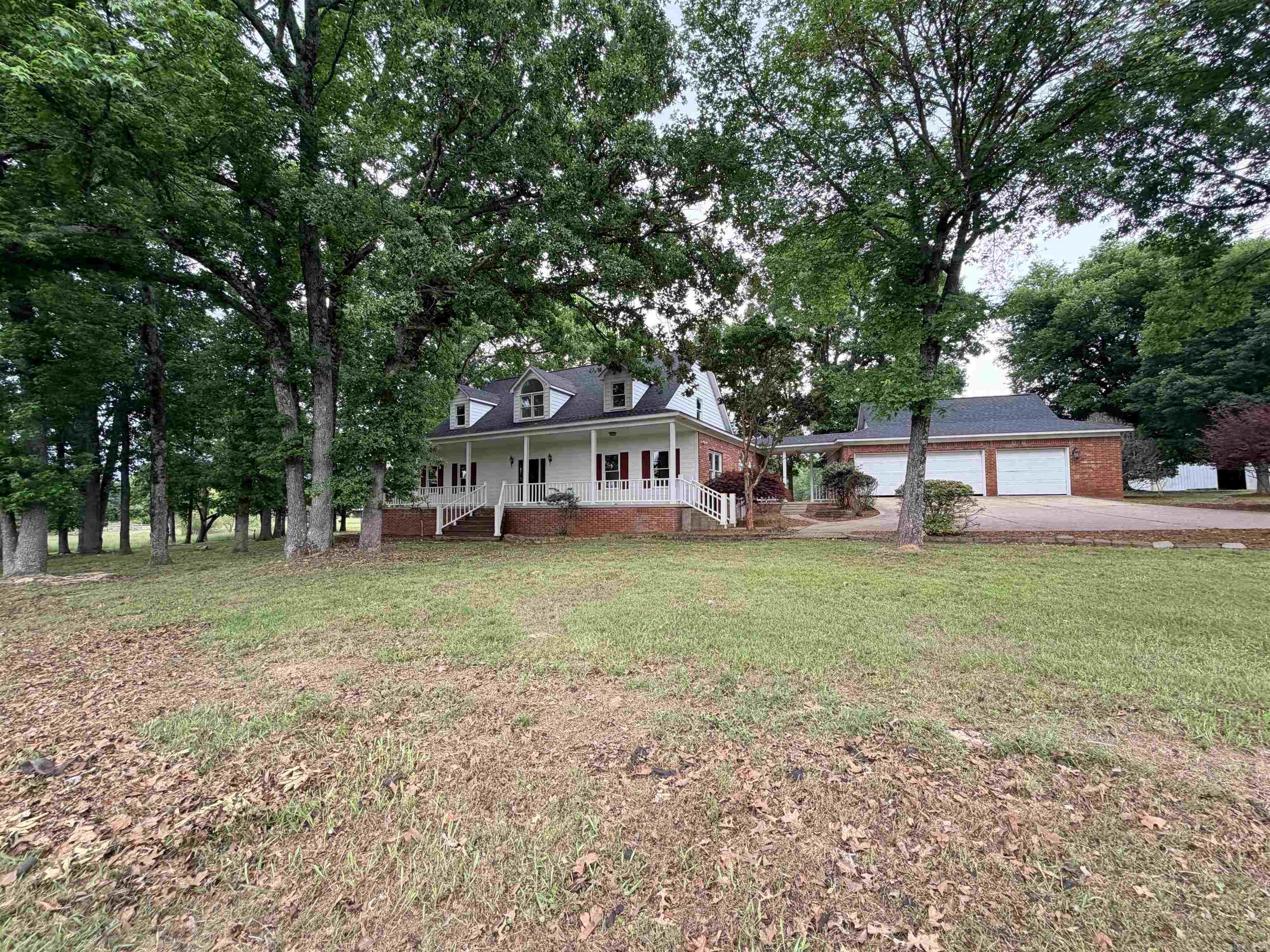 What a beauty! New roof, New flooring, new paint, new granite countertops, this home is picture perfect on a beautiful piece of property with 2 acres! Home also includes a detached 3 car garage, a 24X38 Shop partially enclosed with the front open, and a 50X72 fully enclosed shop. Property is partially fenced in.