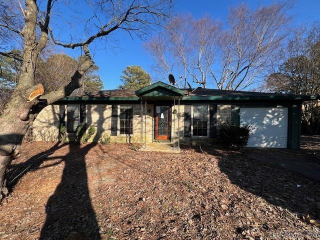 This adorable and well cared for ranch-style home in Lake City is full of warmth and character. Featuring three comfortable bedrooms, one well-kept bathroom, and a quaint kitchen with a window overlooking the backyard, it's the perfect fit for a first home or an investment property. Enjoy the peaceful view from the screened-in sun porch, which opens toward the fenced yard. An attached one-car garage adds convenience and completes this sweet, easy-to-love property