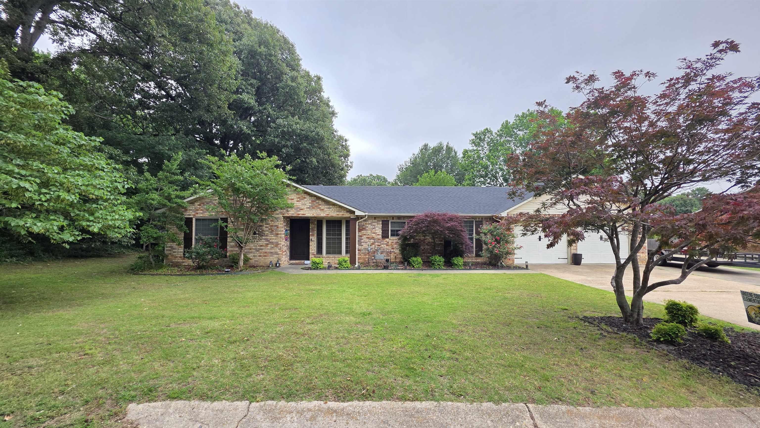 This well-kept 3 bedroom, 2 bathroom home offers comfort, functionality, and thoughtful details throughout. Located on a dead-end street, it provides a low-traffic setting along with extra parking pads for added convenience. Inside, the home features beautiful cabinetry, a kitchen island, pantry, and stainless steel appliances that create a stylish and practical kitchen space. The spacious bedrooms include a welcoming primary suite with a walk-in tiled shower. Enjoy outdoor living on the screened-in back porch, perfect for relaxing in any season. A storage building adds even more versatility for tools, hobbies, or seasonal items. This property blends comfort, storage, and attractive finishes — a great opportunity for anyone seeking a move-in-ready home. Call your favorite agent today!