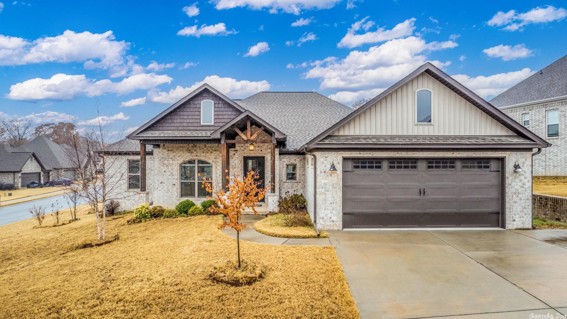 PERFECTLY EXQUISITE OPEN FLOOR PLAN HOME W/HUGE FRONT PORCH & CEDAR ACCENTS ON CORNER LOT.EXTRA WIDE ENTRY W/WOOD-STYLE TILE FLOORS,WINDOW-LINED LIVIING AREA W/CUSTOM FIREPLACE & BUILT-INS,BEAUTIFUL KITCHEN CABINETRY W/LIGHTED SEE-THROUGH UPPERS,GRANITE COUNTERTOPS,SS APL,DBL OVENS,WINDOW-LINED DINNING NOOK,HUGE SEPERATE MST SUITE W/EXTRA LARGE MST BATH W/DBL WALL-LINED VANITIES,OVERSIZED SOAKING TUB,CUSTOM TILED SHOWER & HUGE WALK-IN CLOSET,GARAGE ENTRY OFFERS BUILT-IN LOCKER NOOK & HALF BATH,LARGE LAUNDRY ROOM W/CABINETRY & SINK,EXTRA FINISHED BONUS SPACE W/H/A (NOT INCLUDED IN SQ/FT)ABOVE GARAGE PERFECT FOR OFFICE, PARTIALLY COVERED BACKPORCH W/OVERSIZED FENCED BACKYARD W/FRONT & SIDE ENTRY GATES..TUCKED IN POPLAR MILLER'S CROSSING AREA HANDY TO EVERYTHING