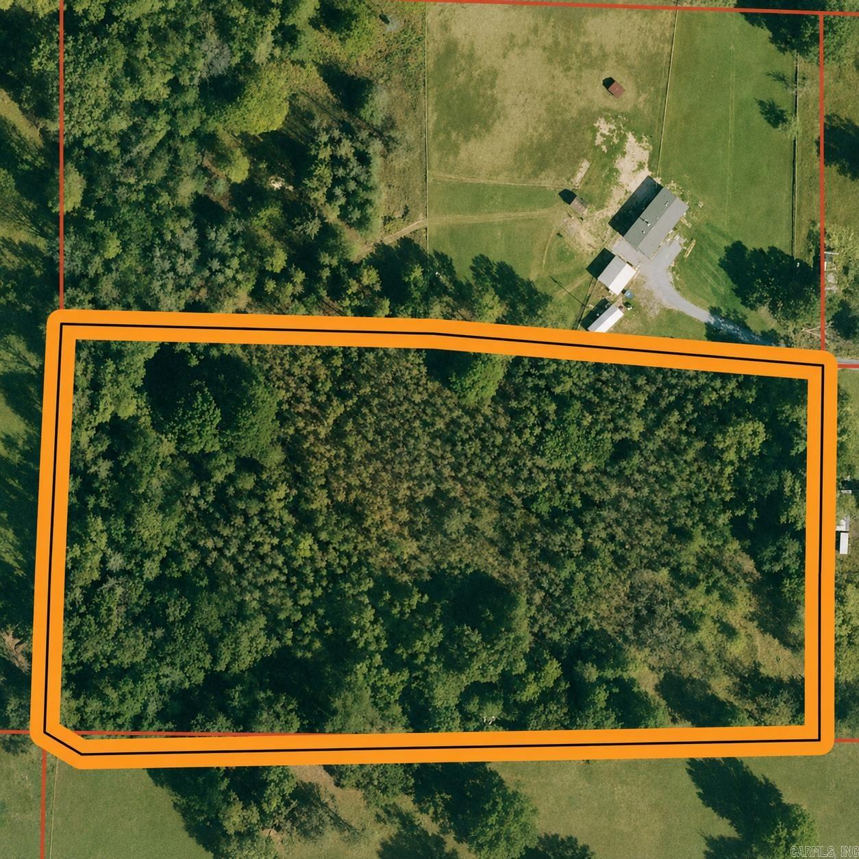 Approximately 5 acres (+/-) located at the end of a quiet dead-end road, offering privacy and peaceful country living while still being convenient to town. An existing survey identifies the property as approximately 5 acres (+/-). Improvements are already underway, including a newly installed driveway, cleared homesite pad, and selective land clearing. A perk test is currently in process, and a 911 address has been assigned and is being finalized. With no known restrictions against mobile homes, tiny homes, or site-built homes, this property offers excellent flexibility for your future plans. Whether you're looking to build your dream home, place a manufactured home, create a weekend getaway, or invest for the future, this property presents a great opportunity in a desirable rural setting.