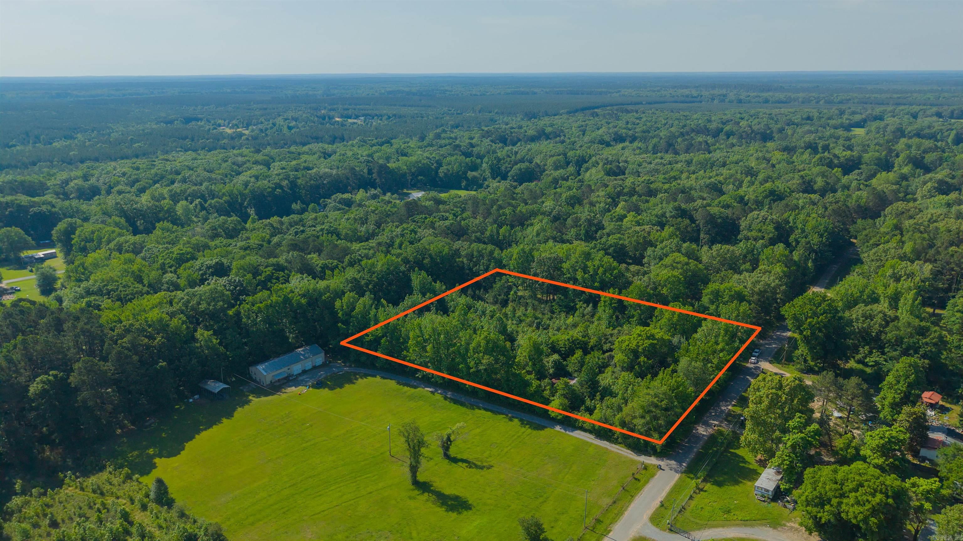 ATTENTION BUYERS & BUILDERS IN THE SHERIDAN AREA! Uncover the boundless potential of this 4.12-acre property off Delta Circle Road in beautiful Grant County. Ideal for those seeking space, privacy, and a rural lifestyle, this land is already fenced/cross-fenced and features a pond and a barn (in good shape at last check). While the existing structure and sheds convey at no value and will need to be removed, they offer a clear footprint for your new custom construction. Bring your animals, your clearing equipment, your building plans, and your vision to this unique piece of land. Imagine the possibilities once you clear the brush and reveal your dream homesite! Don't wait—opportunities like this don't last long. Schedule your tour today! See agent remarks. SqFt approx; measuring encouraged.