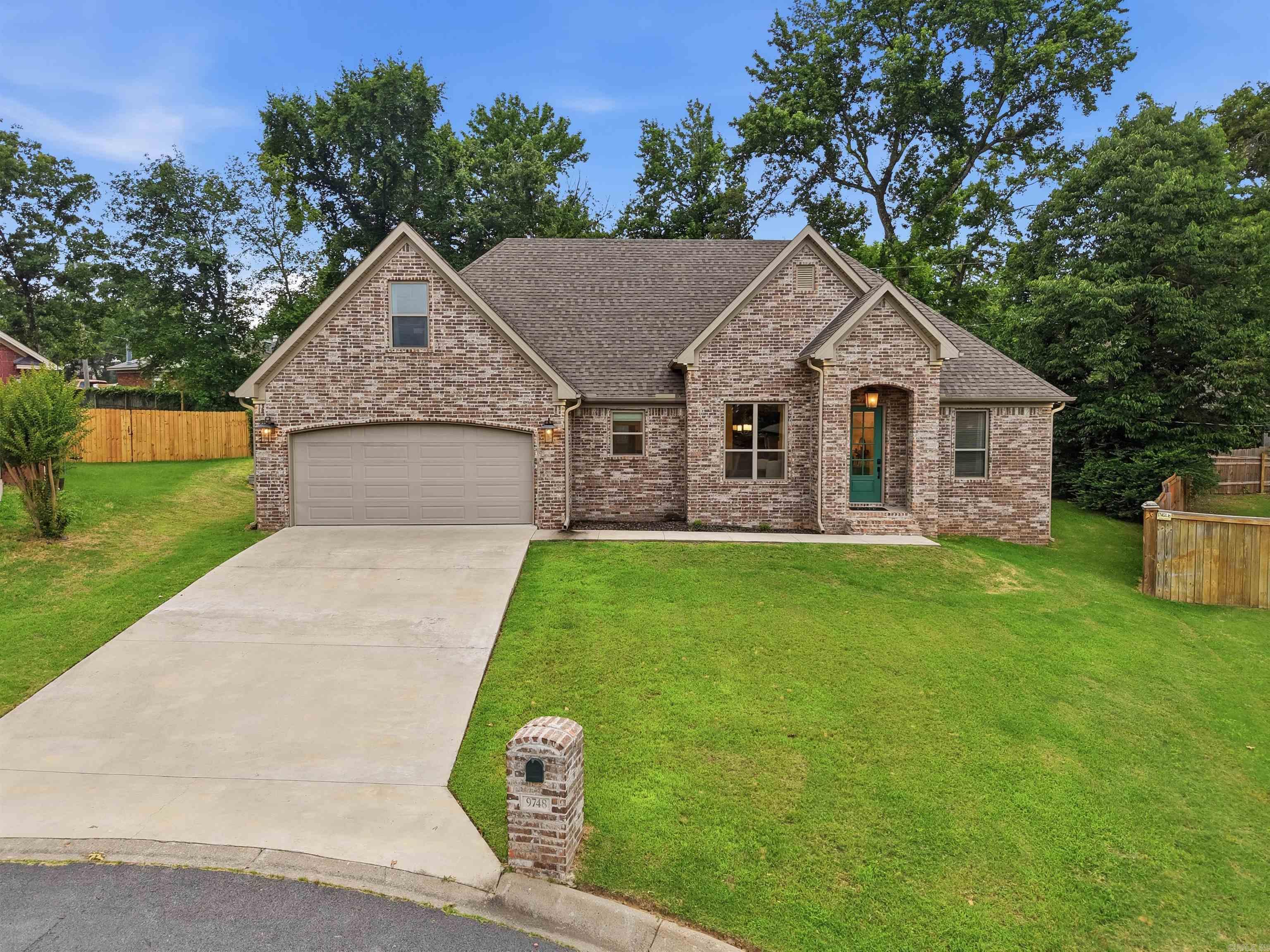 Beautiful 4 bed/3 bath home in cul-de-sac that still feels like a new home!  Built in 2022, this stunning home boasts an open floor plan that flows seamlessly from the living room to kitchen and dining area. The kitchen features quartz countertops, large island, pantry, and a custom backsplash. The gas fireplace with tile in the living room serves as the centerpiece to the room. The large primary suite has tray ceilings in the bedroom, a soaking tub, a fun tile shower design, and an oversized closet that wraps around to the laundry room. 2 guest bedrooms and a full bathroom are on the other side of the downstairs area.  Upstairs, you'll find the 4th bedroom and a full bathroom.  The 4th bedroom can also be used as a bonus room, office, workout room, theater room, craft room, and so much more.  Outside is a covered back patio with ceiling fan looking out into the back yard. Great location with easy access to Little Rock Air Force Base, shopping, and restaurants.