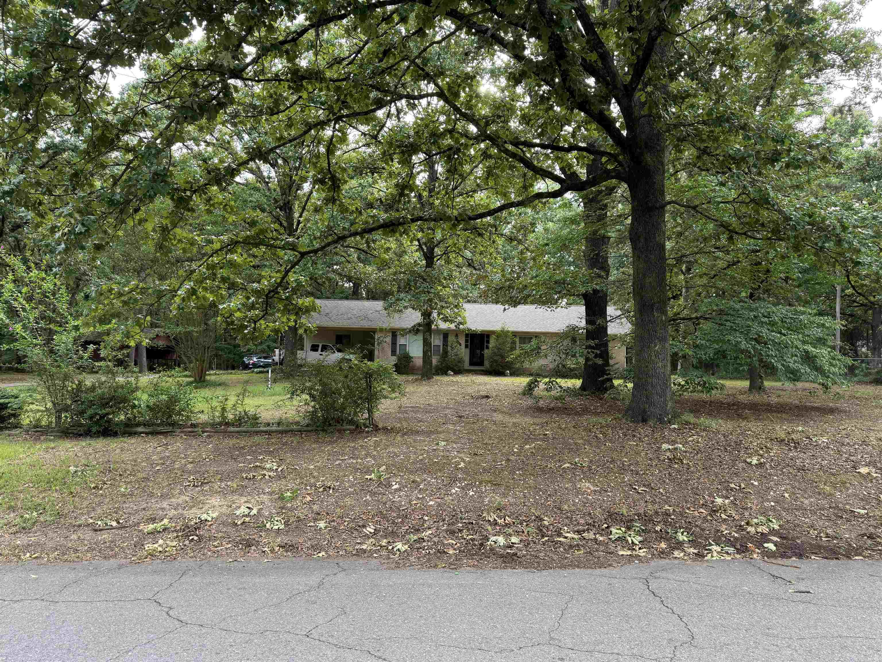 Great 1 owner home that has been well maintained over the years.  There is plenty of room to roam with this country feeling home that is located between Benton and Bryant in Hurricane Heights right off of Highway 5. There is .91 of an acre here with a shop with electricity and a separate large RV or boat cover.  The home has a great layout with newer LVP flooring located int the living areas of the house. There is a living room, breakfast room, dining room, breakfast bar, and a separate laundry room!  Take a look at this house that is waiting for you to call it HOME!  There are 2 lots located behind the house on Huffman that are listed.
