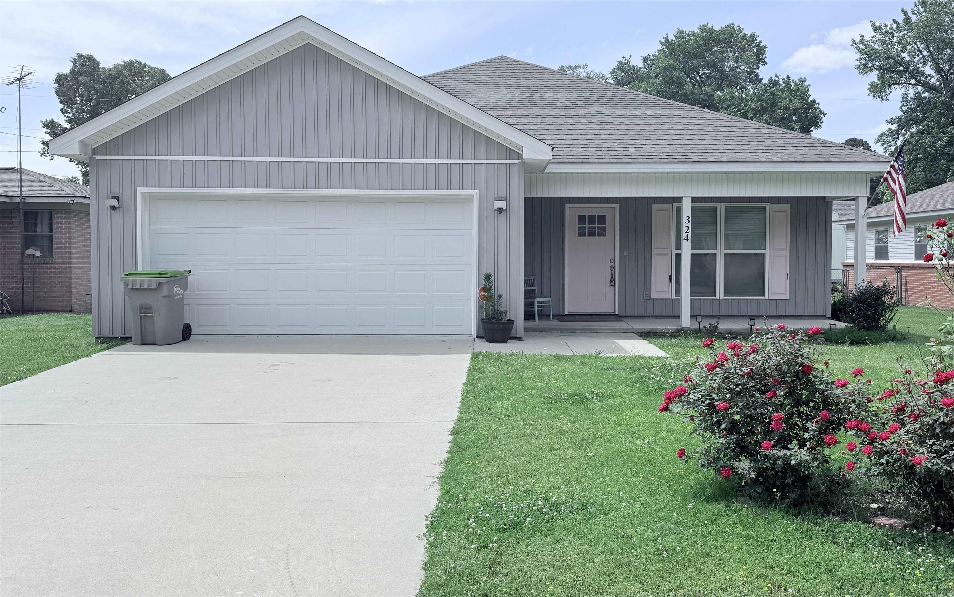 Discover this welcoming 3-bedroom, 2-bath home in the highly desirable Troutt subdivision of Benton. An open-concept design connects the living, dining, and kitchen areas, creating a bright, comfortable space perfect for everyday living and effortless entertaining. The eat-in kitchen features stainless steel appliances, a breakfast bar, and generous cabinet storage. The primary suite offers a private bath and a thoughtfully designed closet with built-in organization. Two additional bedrooms provide great flexibility for guests, family, or a dedicated home office. A separate laundry room and an attached 2-car garage add convenience and functionality. Enjoy outdoor living on both the covered front porch and the covered back patio—ideal spots for morning coffee or evening relaxation. The fully fenced backyard offering plenty of room to play. Move-in ready and situated in a prime location, this home delivers comfort, convenience, and a layout that fits a variety of lifestyles.