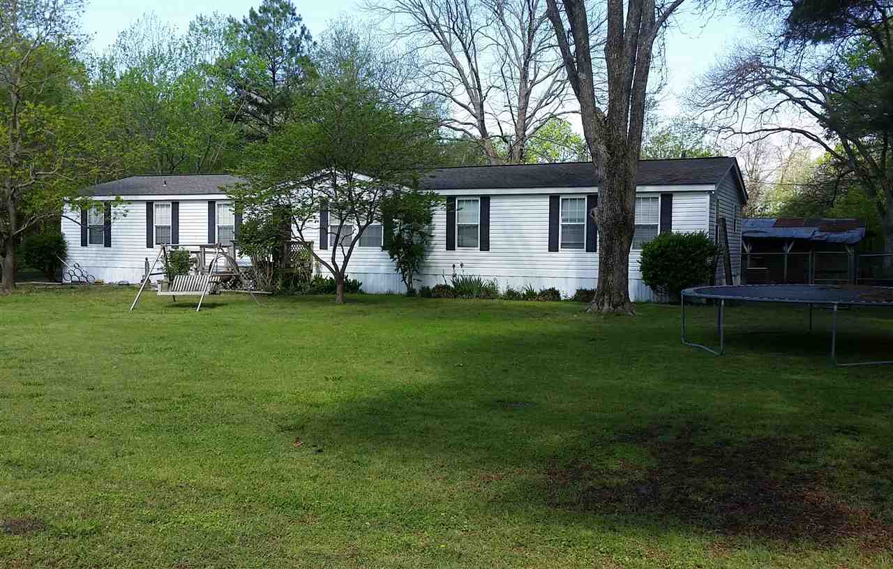Well Maintained Home, 4BR 2BA has a large formal dining/den with a fireplace. Walk-In-Pantry. Kitchen cabinets with updated features. Master Suite is spacious with a sitting area. Large Master bathroom with a walk in closet & built-ins. Three bedrooms are separate from the Master Bedroom. Utility Room with access to the back yard. Fenced backyard on a dead end street. Call our office to see this house for yourself! 870-247-2040 Taxes reflect homestead credit.