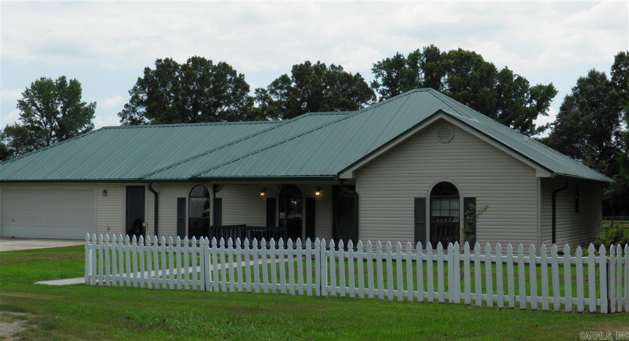 Country living at its best!  Lots of elbow room, outside storage buildings, and a storm shelter.  Beebe Public Schools.  This one will not last long!