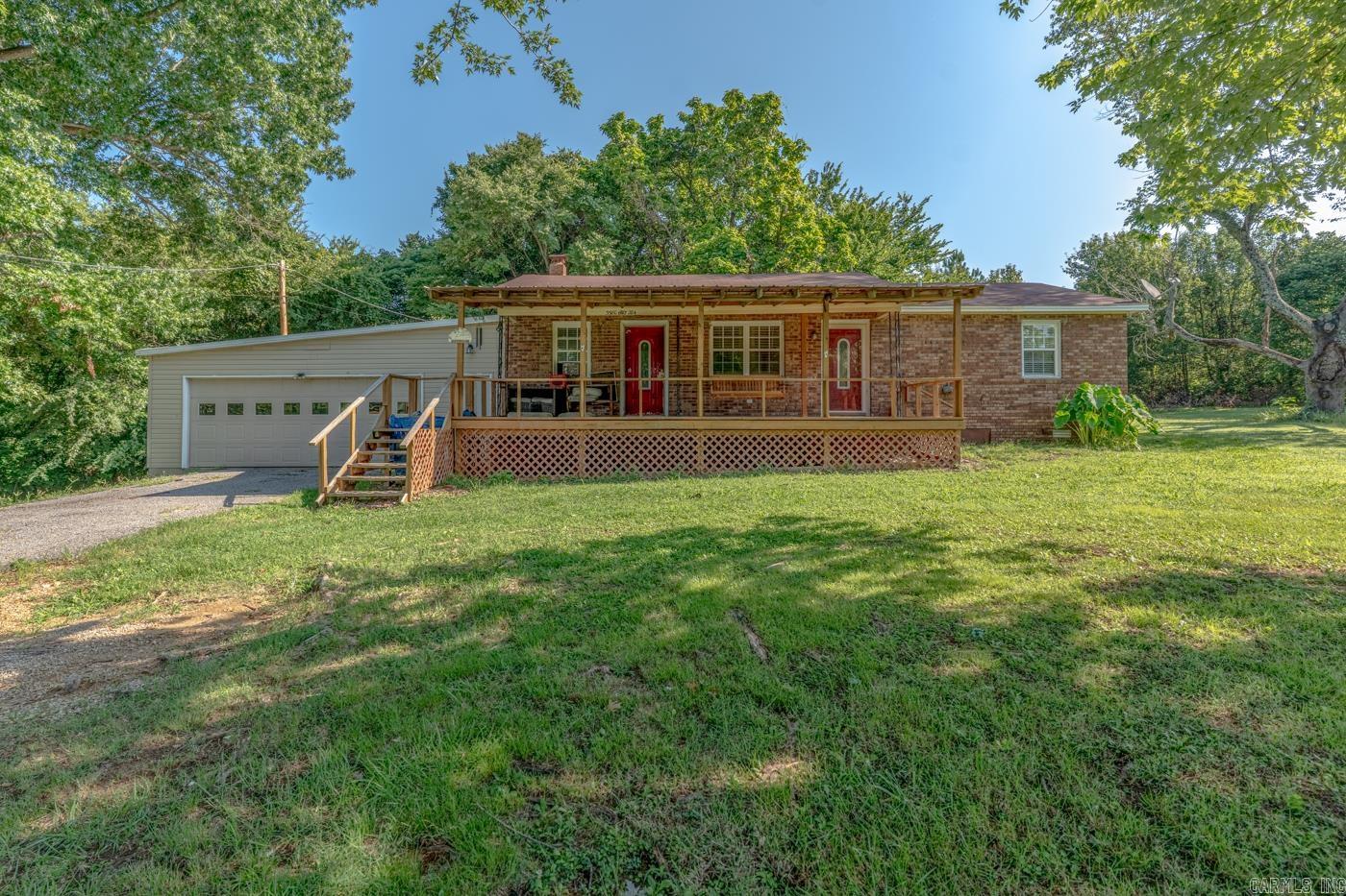 Welcome to the market, 3580 Highway 284, Wynne, Arkansas! This 3-bedroom, 1.5-bath home offers 1,056 +/- square feet of comfortable living space and is conveniently located just approximately 3 miles from Village Creek State Park. Enjoy outdoor living with a spacious screened porch in the backyard, perfect for relaxing or entertaining, along with a fenced backyard for added convenience. The HVAC system is only 1 year old and includes a transferable warranty with approximately 9 years remaining, and the water heater is also recently replaced. A covered front porch, attached garage, and mature shade trees add to this property’s appeal. This home is being sold as-is, offering a great opportunity to make it your own. Schedule your private showing today!
