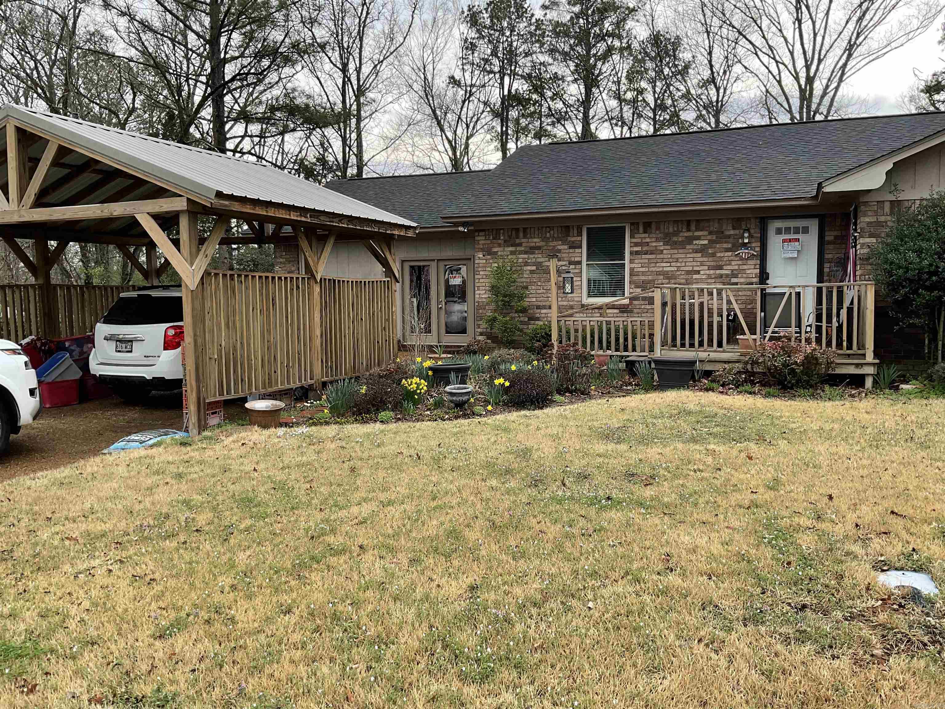 Great Starter home sitting on .94 acres great views Garage was converted into a room it does have window unit with a full  bathroom. Large living area, kitchen has new cabinets new counter tops.