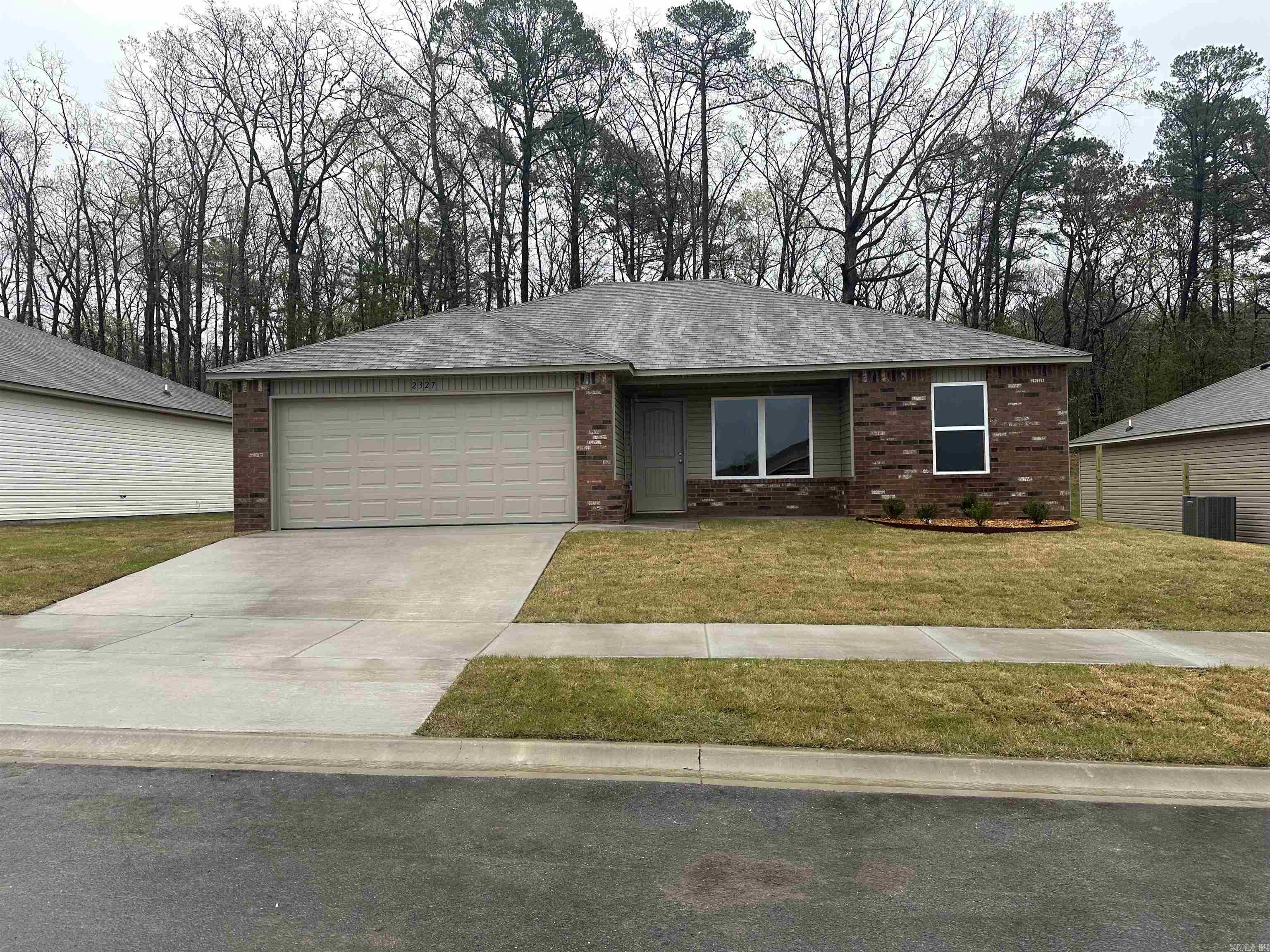 Come explore the Coleman plan! This home is a split, open-concept floor plan with lots of clever features and great use of space. 2-10 Homebuyer Warranty included at no extra cost to Buyers.   Upgrades included by design: soaker tub/shower combo in Master Bath, plumbing faucet upgrade 2, raised ceilings in Living Areas per municipal requirements, Cheyenne style interior doors, baseboards level 2, full sod, microwave hood in Kitchen, smooth top range.    THIS HOME IS SCHEDULED TO BE COMPLETE IN MID FEBRUARY.   $100 initial assessment collected at time of closing.  Hilldale Crossing is convenient to HWY 5, the HWY 30/430 interchange, and Outlets of Little Rock.