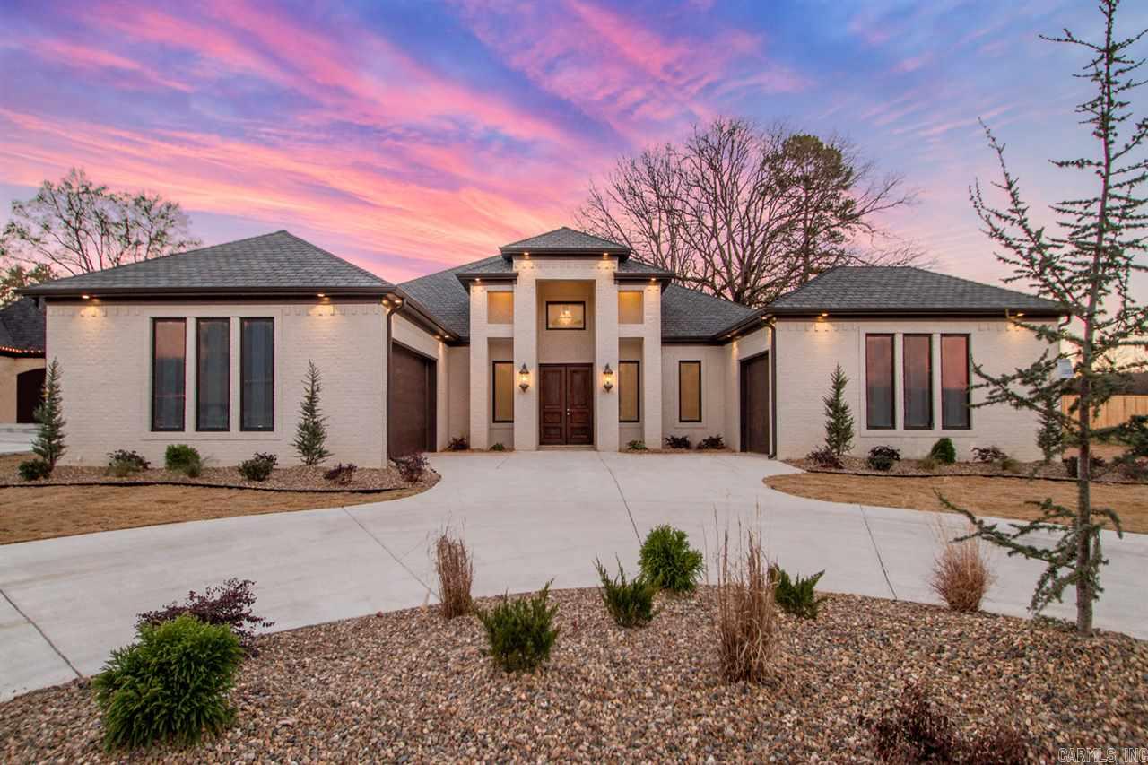 This gorgeous one level custom home offers 4 bedrooms 3 1/2 baths, tall ceilings and open concept, split floor plan, large bonus room, custom showers, gorgeous kitchen, electric fireplace, modern garage doors, outdoor fireplace all in Saline Counties newest gated community offering large level lots with hiking trails and water feature.