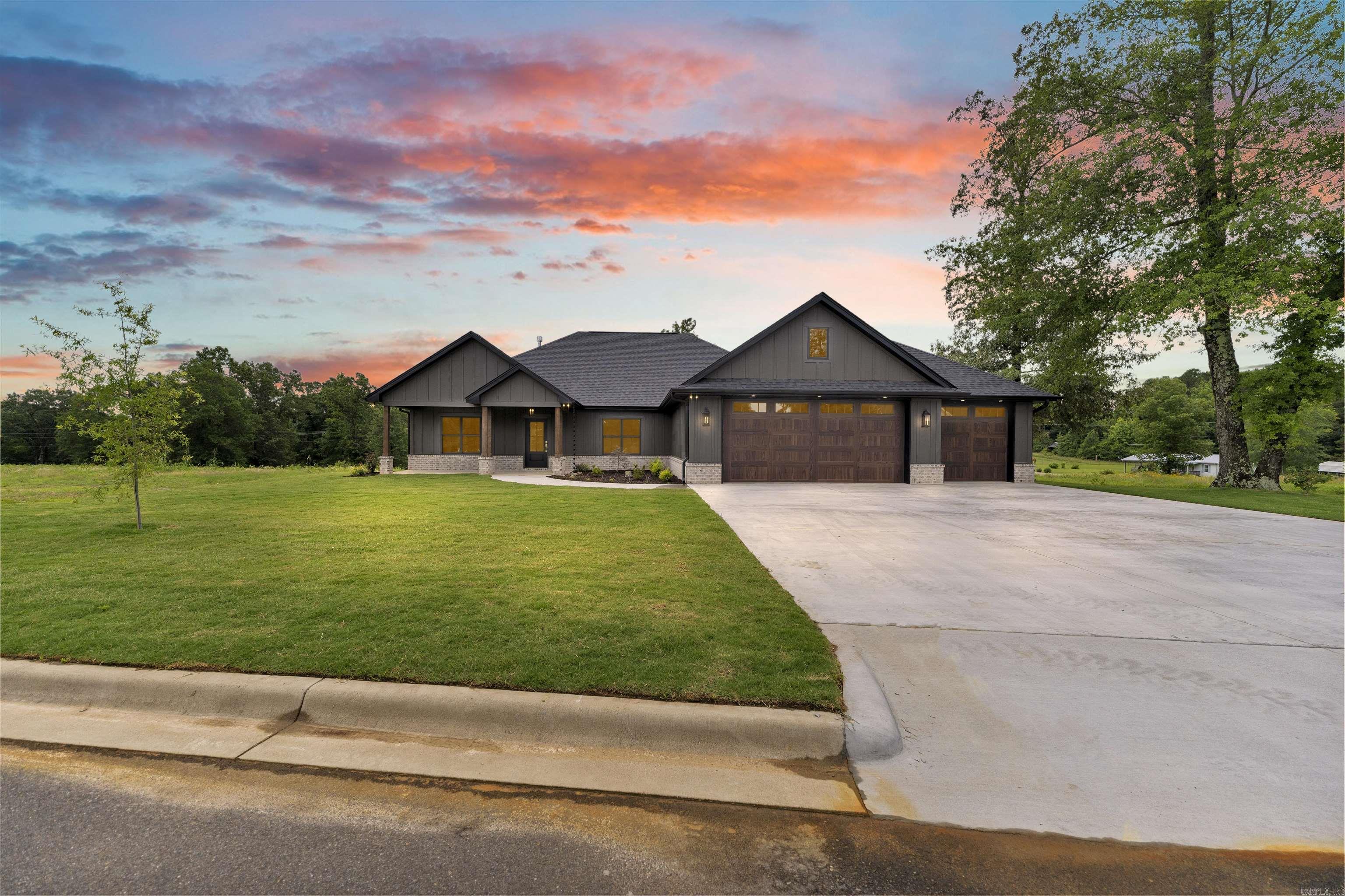 NEW CONSTRUCTION! An exceptional new custom home on just under an acre lot, offering 3 bedrooms, 2.5 baths, and a versatile flex space room. Designed for modern living, the open-concept floor plan features soaring 10-foot ceilings, custom cabinetry, quartz countertops, designer-selected finishes, and abundant storage throughout. The spacious living, dining, and kitchen areas provide the perfect setting for both everyday comfort and effortless entertaining. The primary suite serves as a relaxing retreat with a generous walk-in closet and a beautifully appointed ensuite bath. A large laundry room adds convenience, while the flexible bonus space adapts to your lifestyle needs. Combining quality craftsmanship, luxury finishes, and thoughtful design, this move-in-ready home delivers the space, style, and functionality today’s buyers are looking for! Just minutes from the future biking trails in Mena! Property Taxes will be determined by tax accessor.