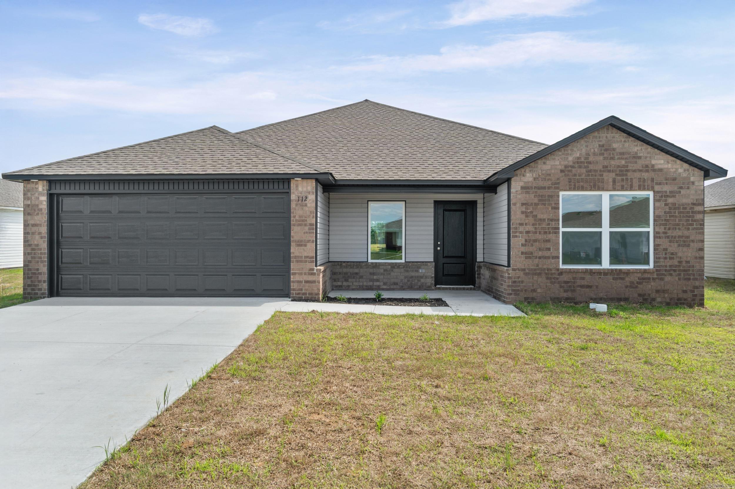 The Kinsley II plan is a wonderful choice for anyone looking for a blend of charm and functionality. The covered front porch adds a warm, inviting touch, perfect for relaxing or greeting guests. Inside, the open floor plan enhances the spacious feel of the home, while the 4 bedrooms and 2 bathrooms ensure plenty of room for family and guests.  The living area is designed for comfort and flexibility, and the dining area/kitchen combo is ideal for entertaining. With energy-efficient appliances, the ample counter space and pantry are great for anyone who loves to cook and experiment in the kitchen.  **SEE SHOWING REMARKS & AGENT REMARKS FOR IMPORTANT INFORMATION**