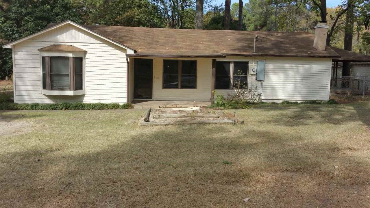 Nicely updated city home on 1.7 acres.  Kitchen boasts oak cabinets with granite counter tops, hand scraped hardwood laminate, gas fireplace in master,  Jacuzzi, abundant closet space, deck with hot tub and gazebo, and a huge workshop with electricity and some plumbing.  Nice and private, yet close to all city amenities.