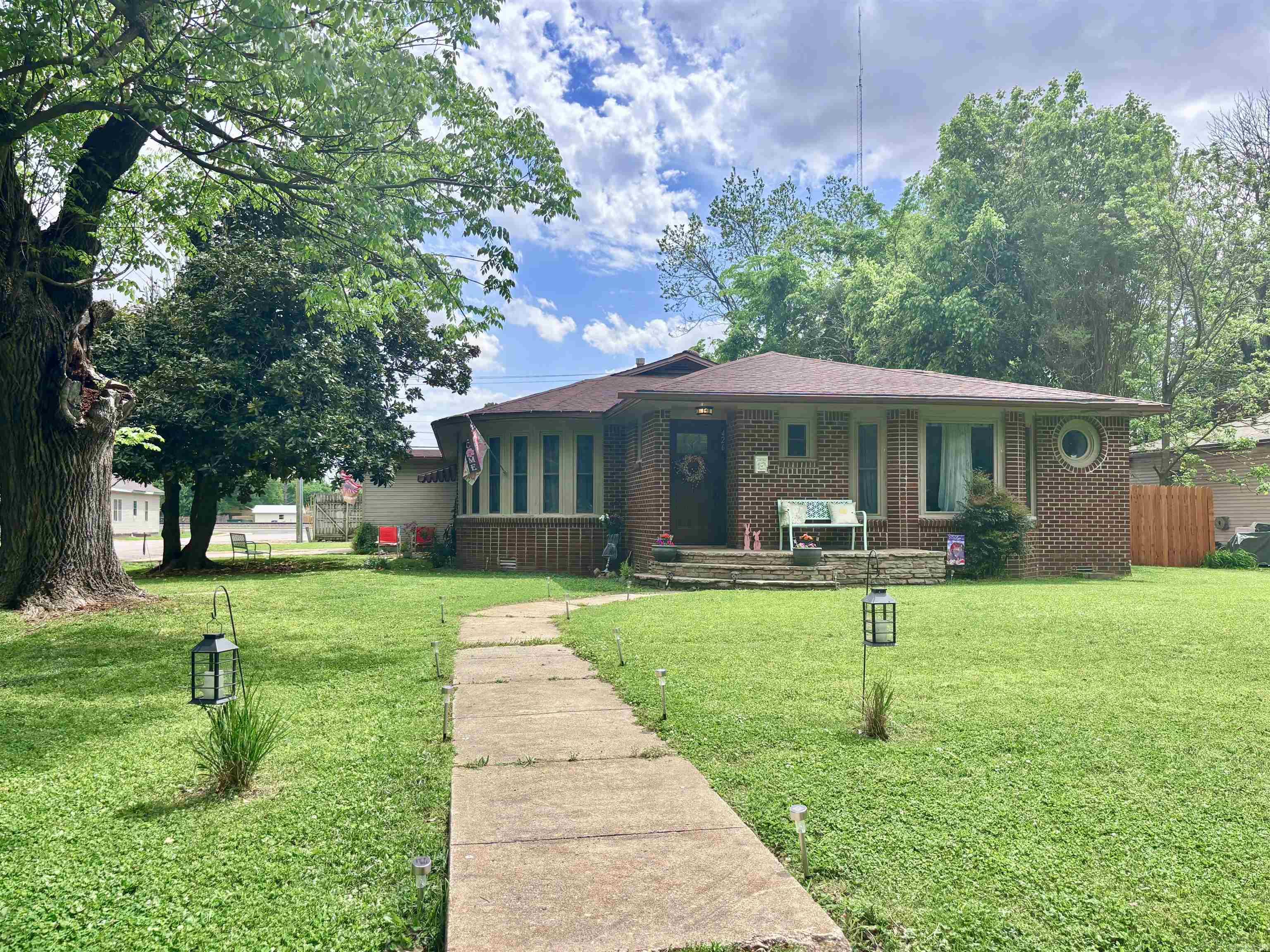 Step into the perfect blend of timeless character and modern comfort in this beautifully remodeled Walnut Ridge home. Bursting with vintage charm, this property has been thoughtfully updated from top to bottom while preserving its original appeal. Inside, you’ll find a completely renovated interior featuring brand-new cabinetry, stylish finishes, and an inviting layout designed for today’s lifestyle. Custom windows fill the home with natural light, enhancing every space with warmth and character. Major updates include a new HVAC system, giving you peace of mind and year-round efficiency. Outside, enjoy a spacious backyard enclosed by a wood privacy fence—ideal for relaxing, entertaining, or creating your own outdoor oasis. This home offers the best of both worlds: classic charm with all the modern upgrades already done for you. Move-in ready and full of personality, it’s a must-see in Walnut Ridge!