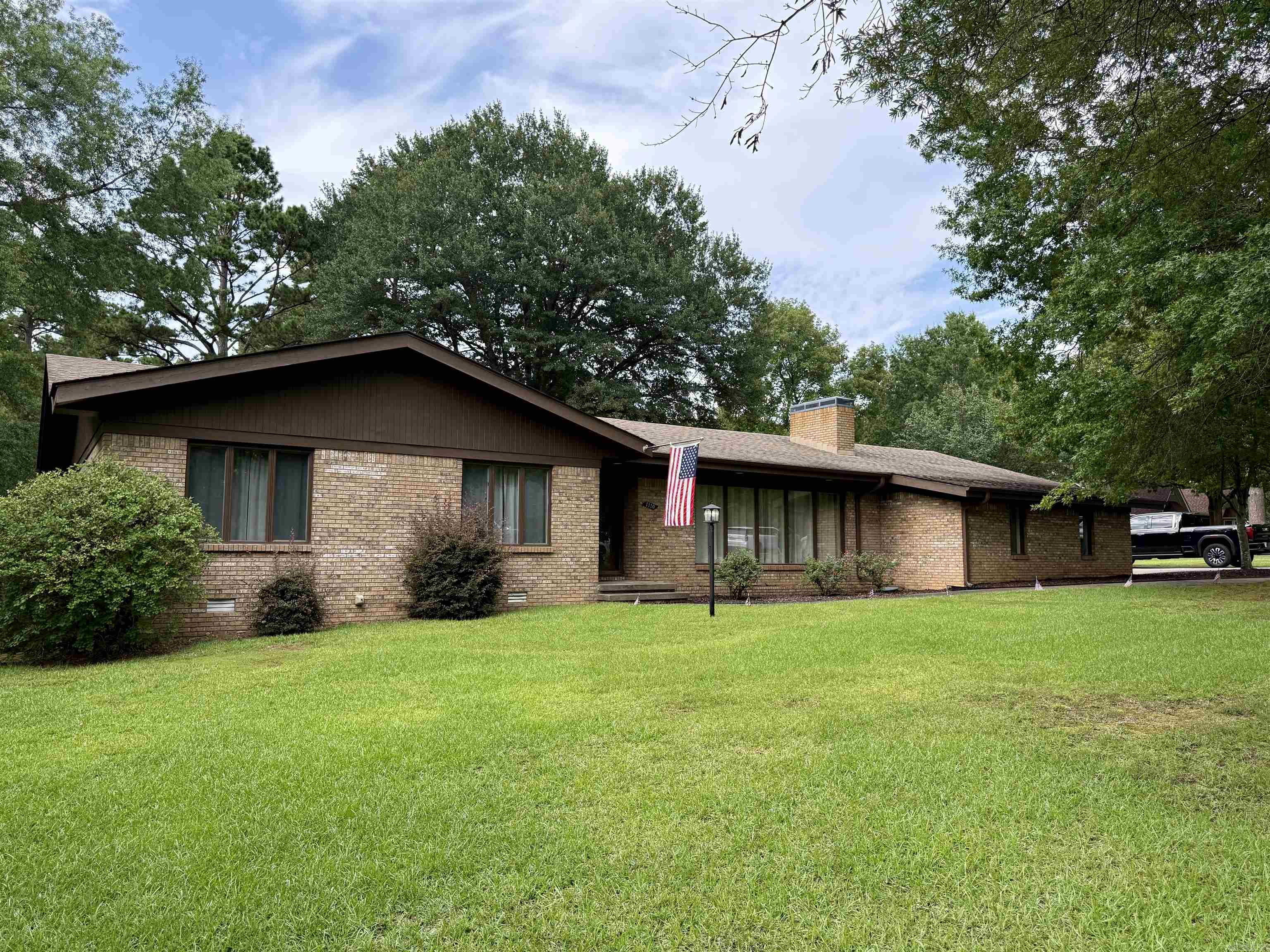 Beautifully renovated 3-bedroom, 2.5-bath home situated on 2 acres along a quiet privately owned street. This home offers the perfect blend of space, privacy, and convenience. Enjoy an oversized attached garage with two large storage rooms, two detached shops with a storm shelter and space to accommodate up to three additional vehicles! Inside, the you will find all the space you need to host family and friends. The fenced backyard provides plenty of space for pets, entertaining, or outdoor activities. Located within walking distance to the lake, this property offers a combination of modernization, livability, and lifestyle appeal. Agents See Remarks.